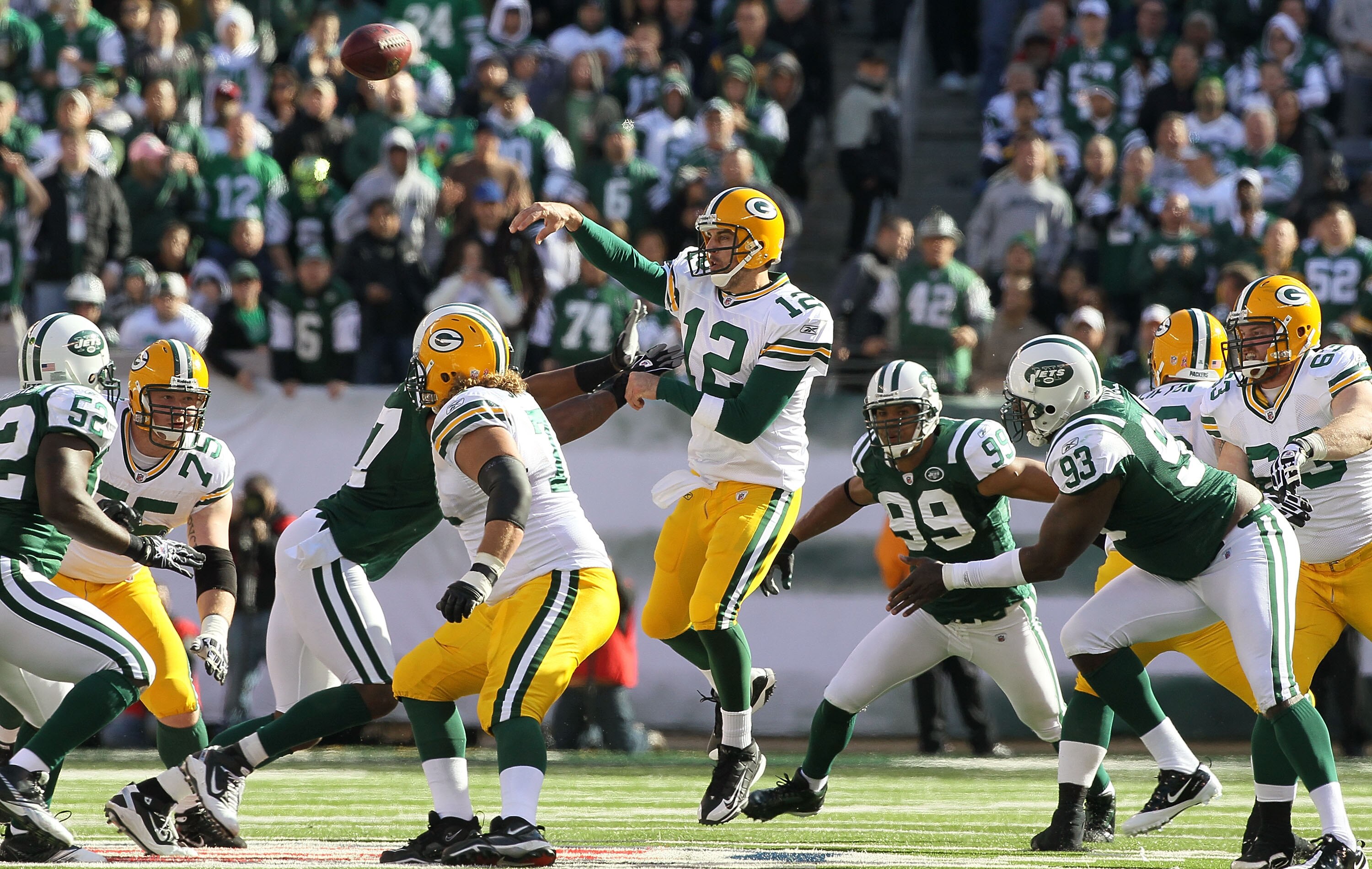 EAST RUTHERFORD, NJ - OCTOBER 31: Aaron Rodgers #12 of the Green Bay Packers throws a pass against the New York Jets on October 31, 2010 at the New Meadowlands Stadium in East Rutherford, New Jersey. (Photo by Jim McIsaac/Getty Images)