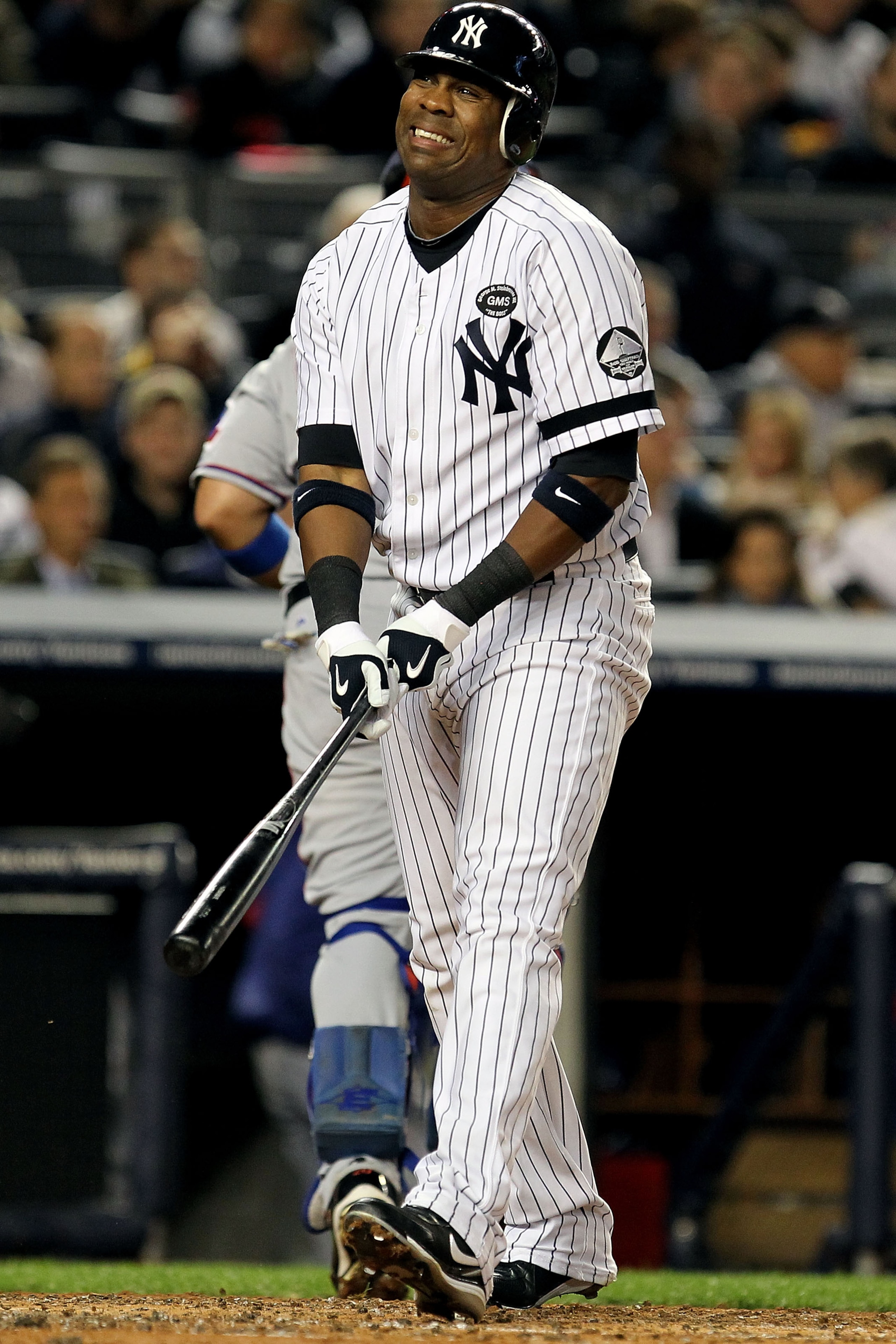 NEW YORK - OCTOBER 18: Marcus Thames #38 of the New York Yankees reacts after he stuck out in the bottom of the second inning against the Texas Rangers in Game Three of the ALCS during the 2010 MLB Playoffs at Yankee Stadium on October 18, 2010 in New Yo NEW YORK - OCTOBER 18: Marcus Thames #38 of the New York Yankees reacts after he stuck out in the bottom of the second inning against the Texas Rangers in Game Three of the ALCS during the 2010 MLB Playoffs at Yankee Stadium on October 18, 2010 in New Yo