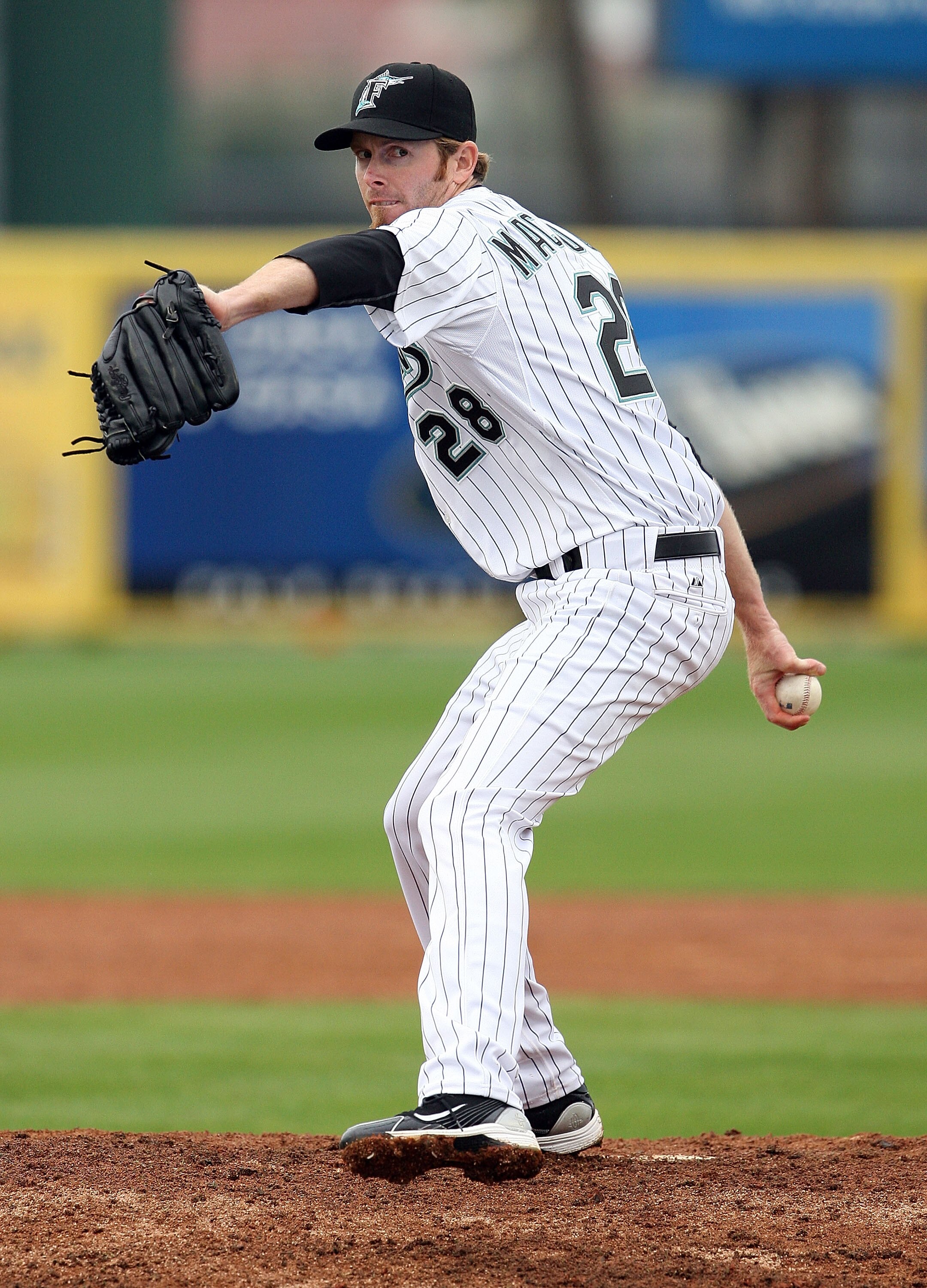 JUPITER, FL - MARCH 17:  Relief pitcher Mike MacDougal #28 of the Florida Marlins pitches against the Atlanta Braves at Roger Dean Stadium on March 17, 2010 in Jupiter, Florida.  (Photo by Doug Benc/Getty Images)