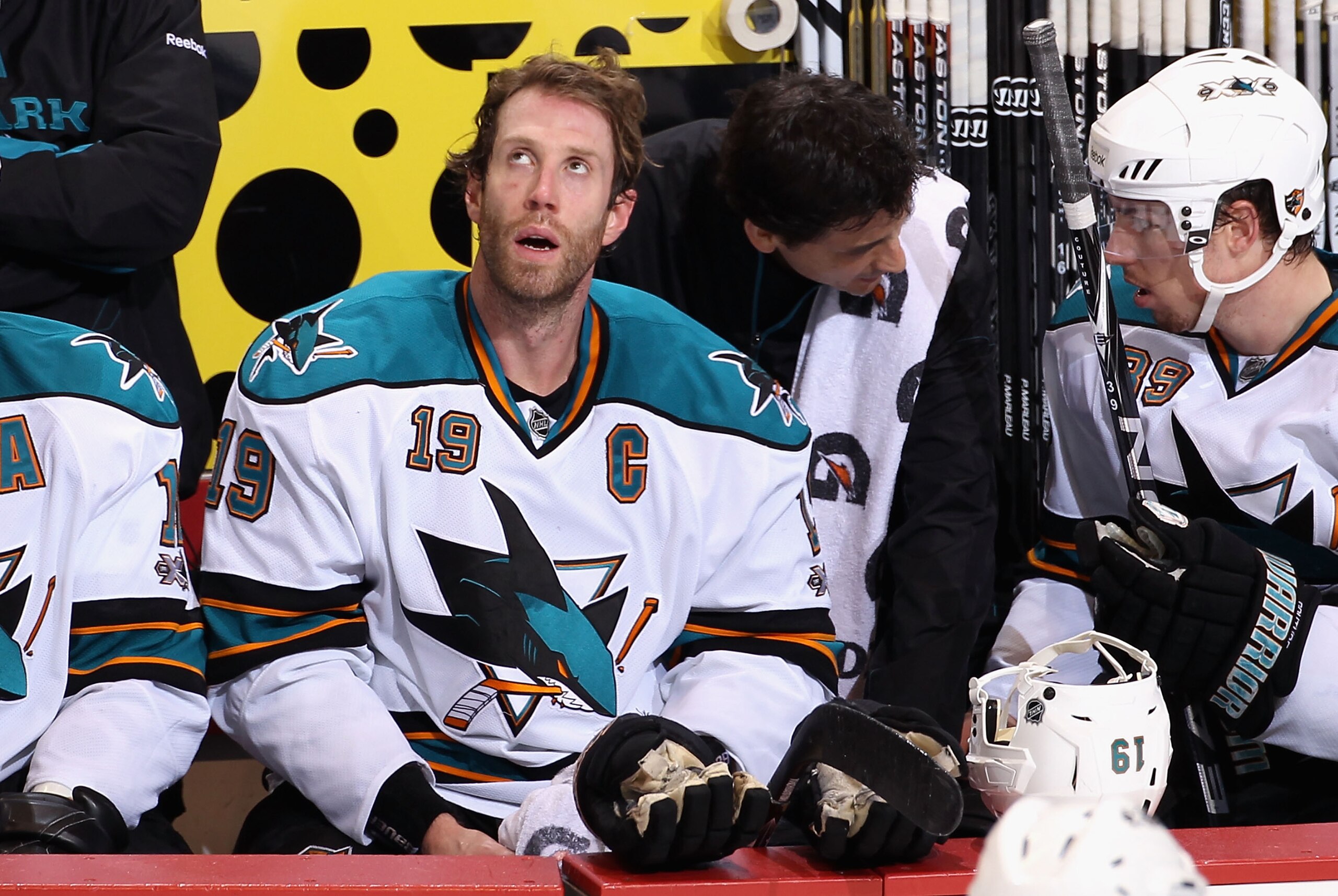 GLENDALE, AZ - JANUARY 17:  Joe Thornton #19 of the San Jose Sharks sits on the bench during the NHL game against the Phoenix Coyotes at Jobing.com Arena on January 17, 2011 in Glendale, Arizona.  The Sharks defeated the Coyotes 4-2.  (Photo by Christian 