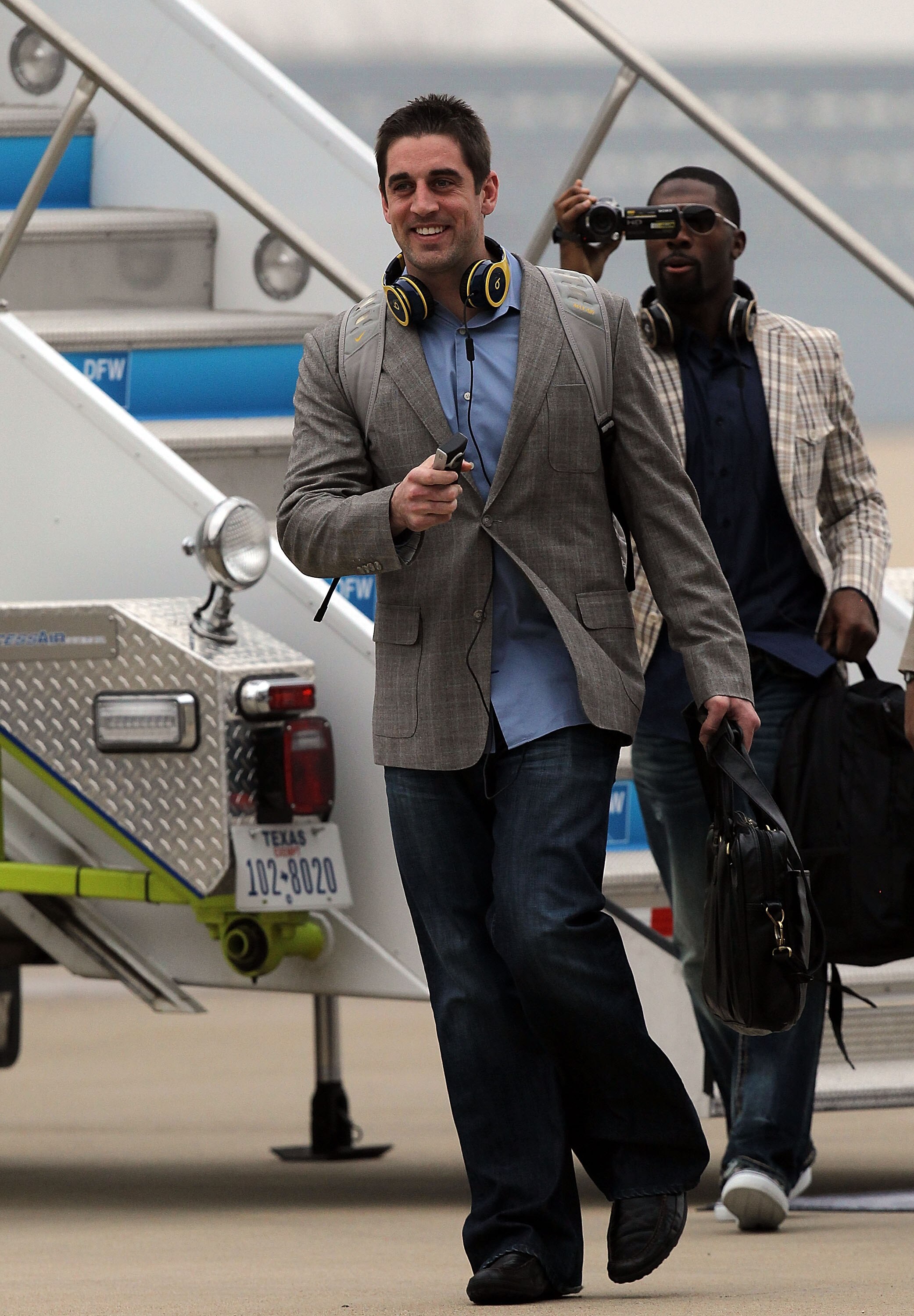 DALLAS, TX - JANUARY 31:  Quarterback Aaron Rodgers #12 of the Green Bay Packers arrives at Dallas Fort Worth International Airport on January 31, 2011 in Dallas, Texas.  The Green Bay Packers will play the Pittsburgh Steelers in Super Bowl XLV on Februar