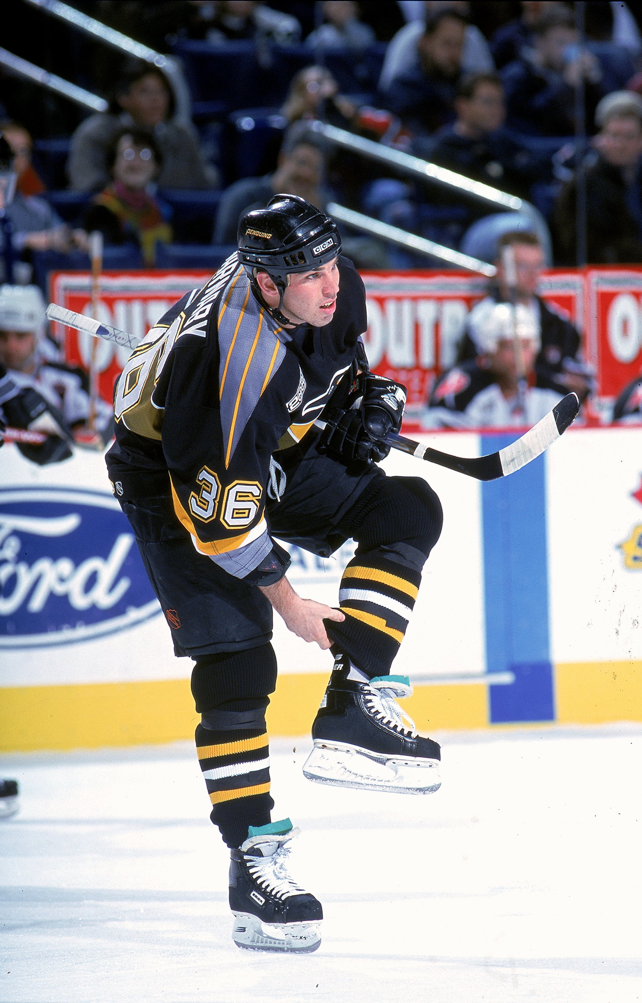 30 Nov 1999: Matthew Barnaby #36 of the Pittsburgh Penguins adjusts his pant legs during the game against the Buffalo Sabres at the Marine Midland Arena in Buffalo, New York. The Penguins defeated the Sabres 4-1. Mandatory Credit: Rick Stewart  /Allsport