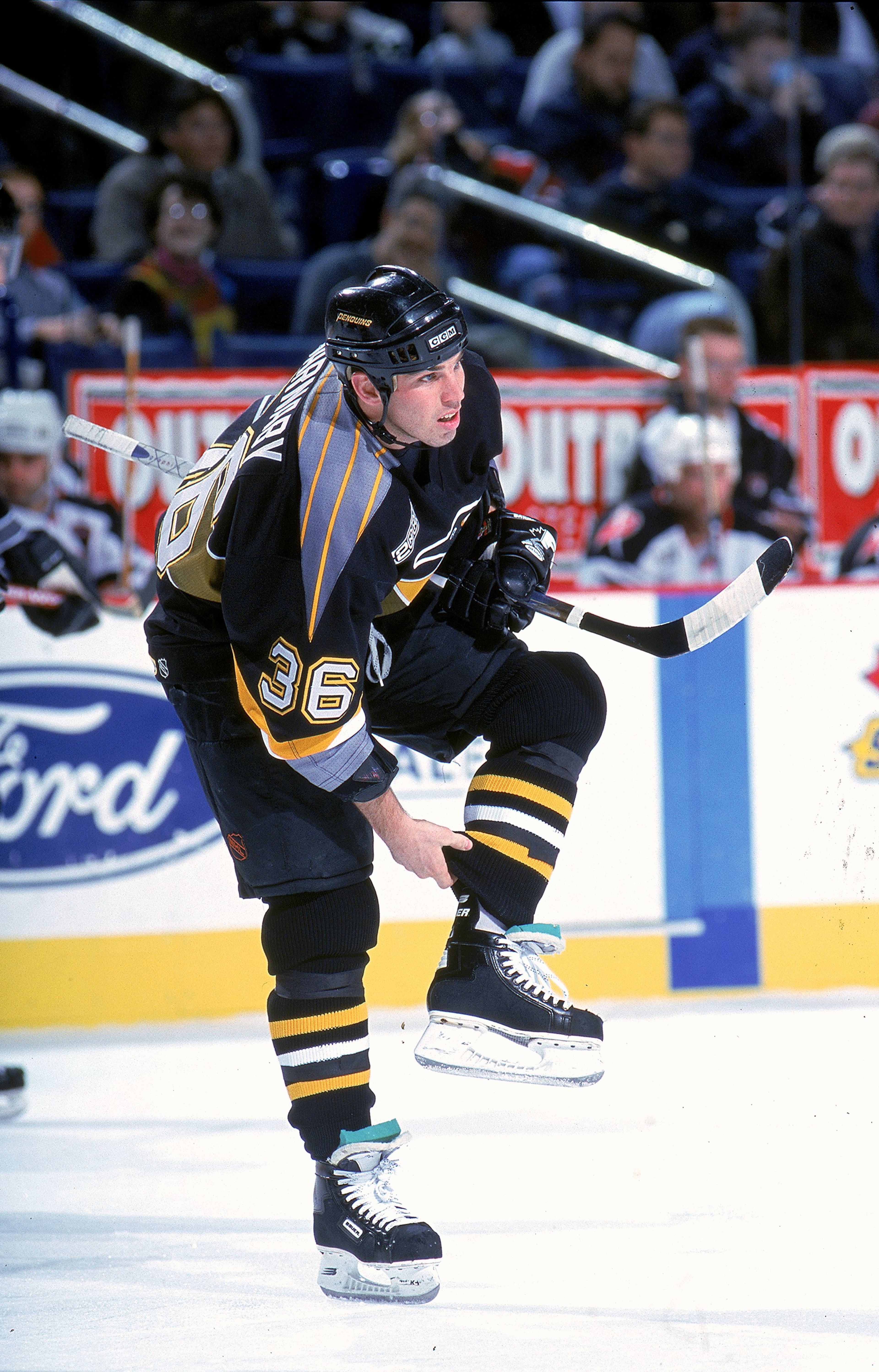30 Nov 1999: Matthew Barnaby #36 of the Pittsburgh Penguins adjusts his pant legs during the game against the Buffalo Sabres at the Marine Midland Arena in Buffalo, New York. The Penguins defeated the Sabres 4-1. Mandatory Credit: Rick Stewart  /Allsport
