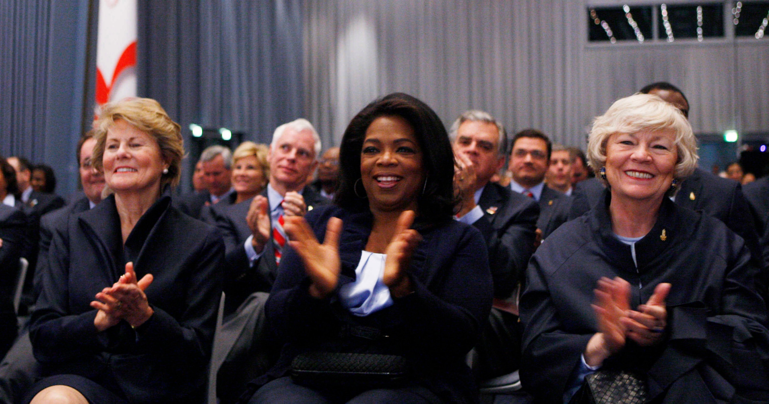 COPENHAGEN, DENMARK - OCTOBER 2: Television talk show host Oprah Winfrey, center, sits with other members of the U.S. delegation as U.S. President Barack Obama finishes his presentation in support of Chicago as the host city for the 2016 Summer Olympic Ga