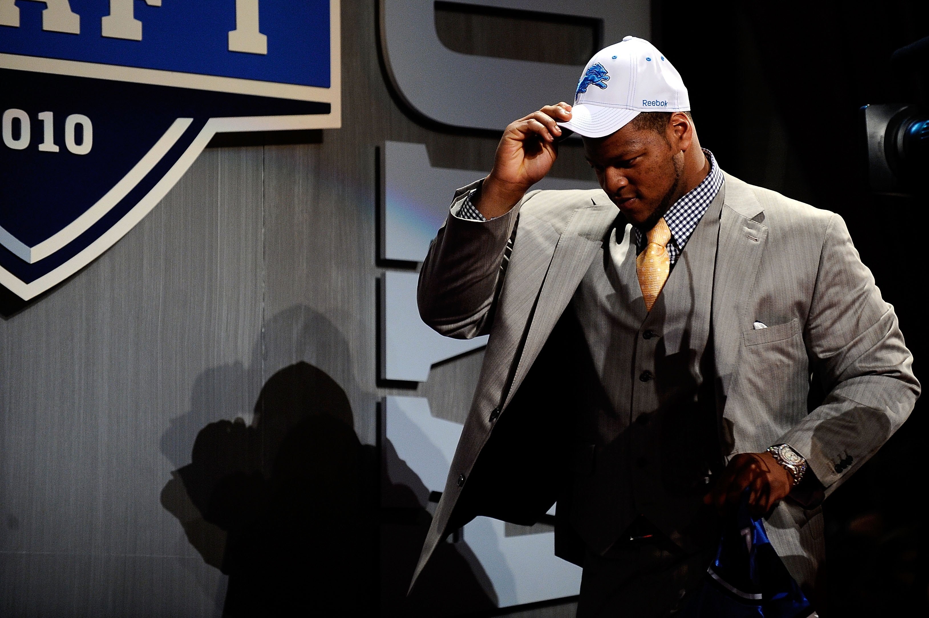 NEW YORK - APRIL 22:  Ndamukong Suh of the Nebraska Cornhuskers walks on stage after he was selected by the Detroit Lions number 2 overall during the first round of the 2010 NFL Draft at Radio City Music Hall on April 22, 2010 in New York City.  (Photo by