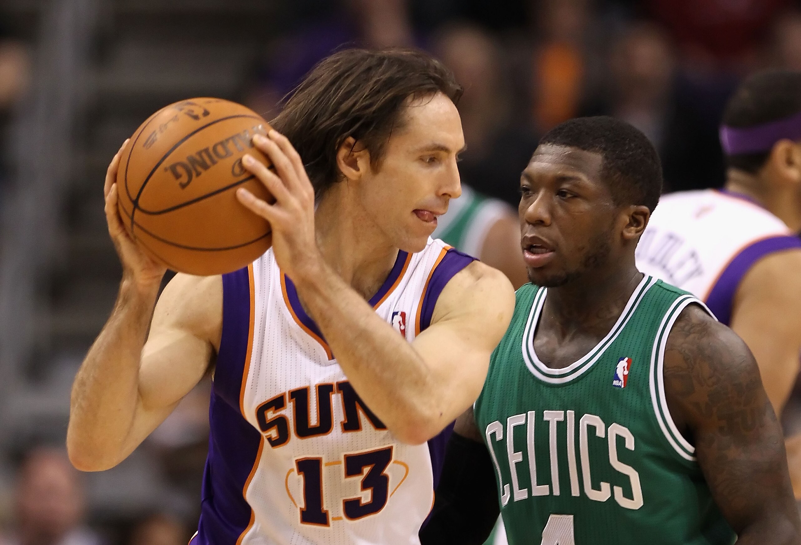 PHOENIX, AZ - JANUARY 28: Steve Nash #13 of the Phoenix Suns handles the ball during the NBA game against the Boston Celtics at US Airways Center on January 28, 2011 in Phoenix, Arizona. The Suns defeated the Celtics 88-71. NOTE TO USER: User expressly a PHOENIX, AZ - JANUARY 28: Steve Nash #13 of the Phoenix Suns handles the ball during the NBA game against the Boston Celtics at US Airways Center on January 28, 2011 in Phoenix, Arizona. The Suns defeated the Celtics 88-71. NOTE TO USER: User expressly a