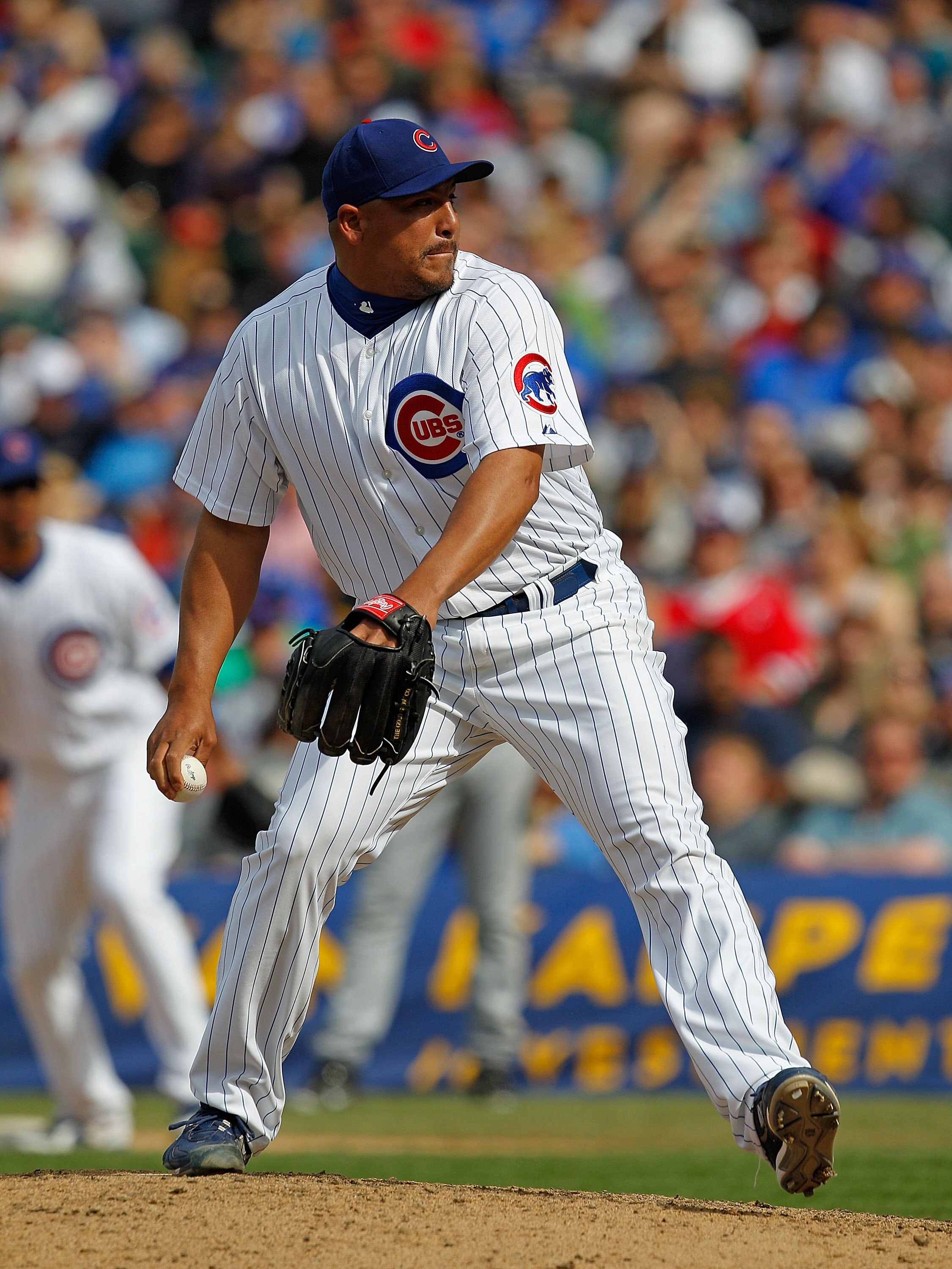 CHICAGO - MAY 14: Carlos Zambrano #38 of the Chicago Cubs pitches against the Pittsburgh Pirates at Wrigley Field on May 14, 2010 in Chicago, Illinois. The Pirates defeated the Cubs 10-6. (Photo by Jonathan Daniel/Getty Images)