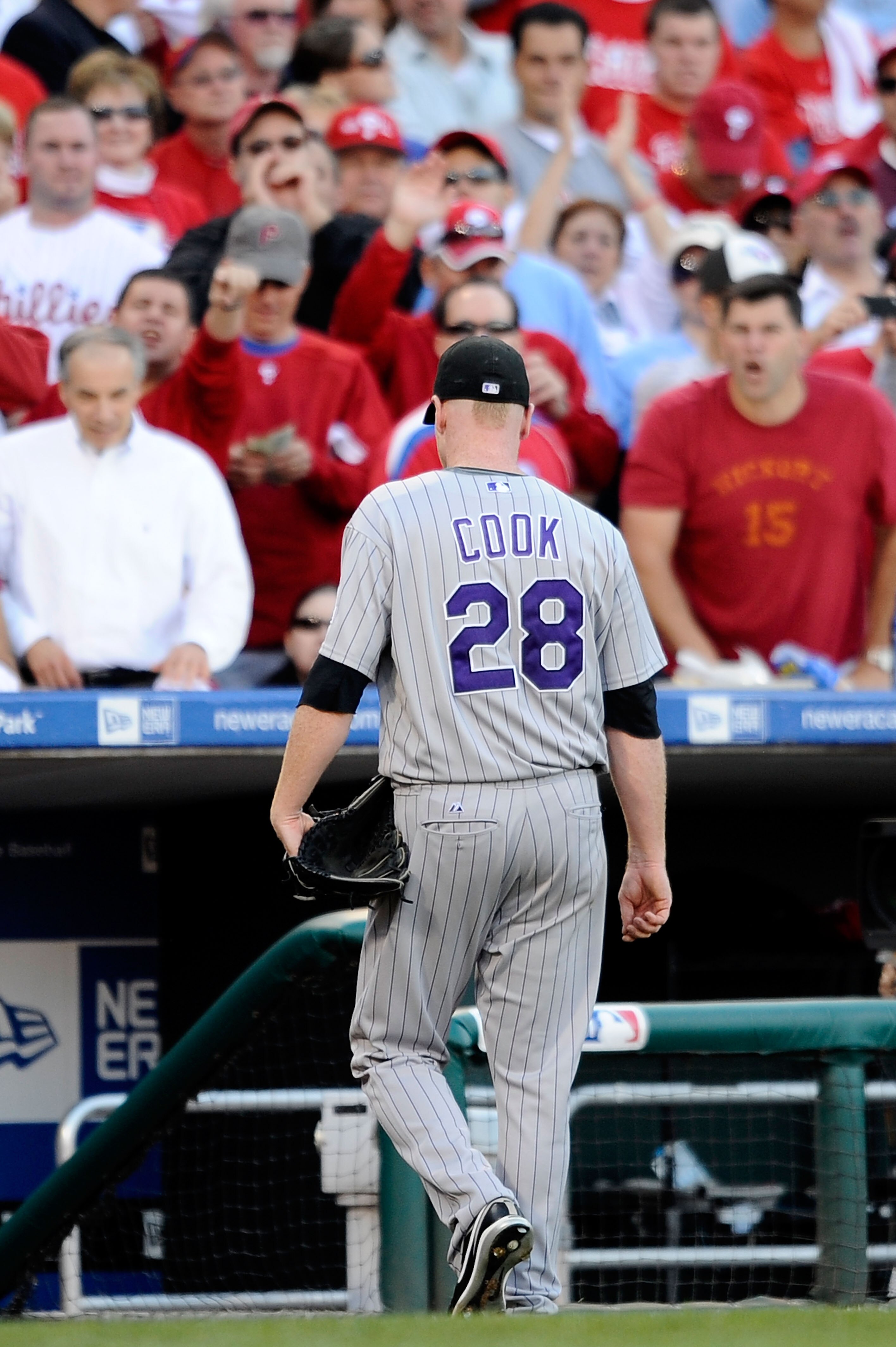 PHILADELPHIA - OCTOBER 08:  Starting pitcher Aaron Cook #28 of the Colorado Rockies is jeered by the fans as he walks back to the dugout after being taken out in the bottom of the sixth inning against the Philadelphia Phillies in Game Two of the NLDS duri