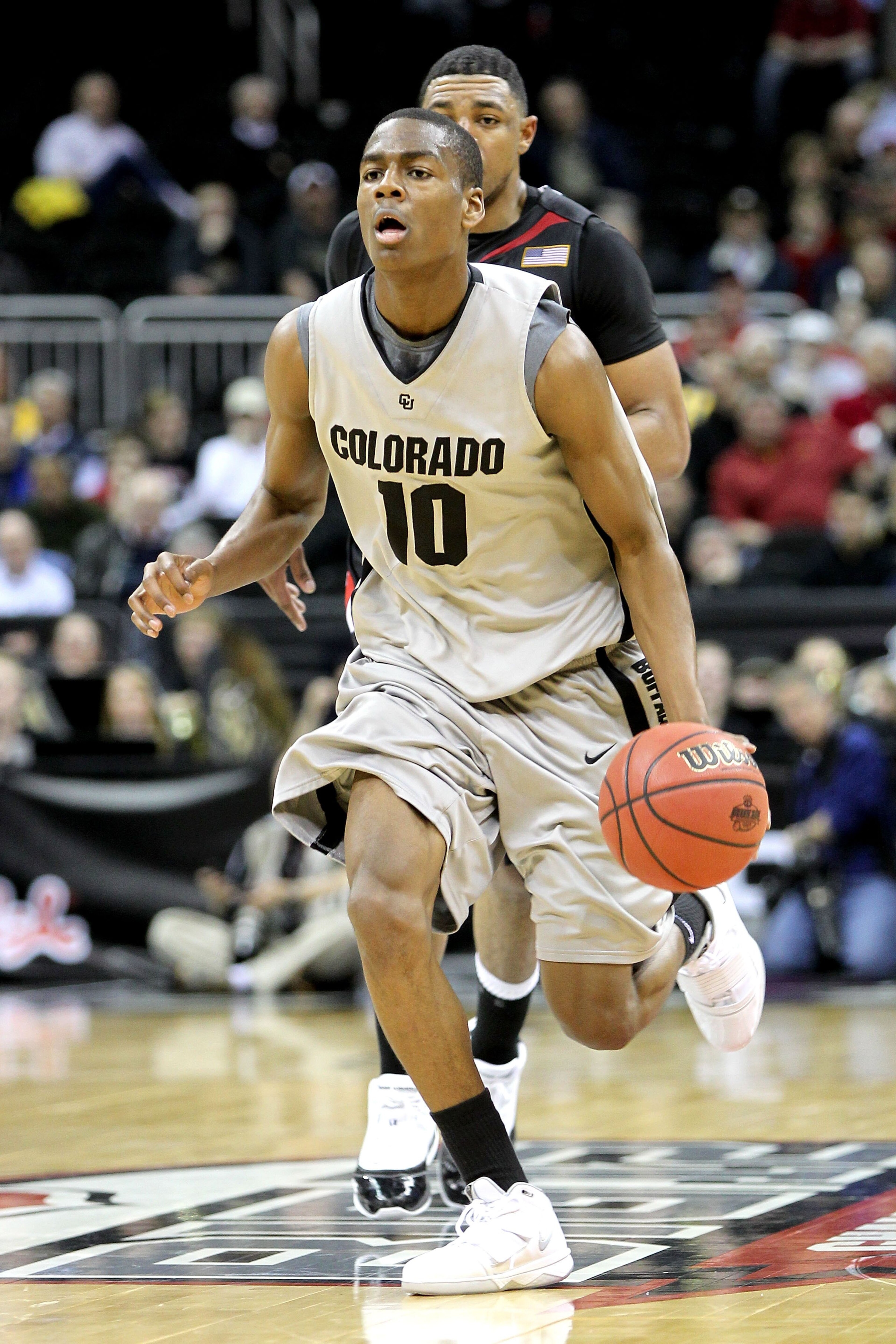 KANSAS CITY, MO - MARCH 10:  Alec Burks #10 of the Colorado Buffaloes moves the ball against the Texas Tech Red Raiders in the first half during the first round game of the 2010 Phillips 66 Big 12 Men's Basketball Tournament at the Sprint Center on March 