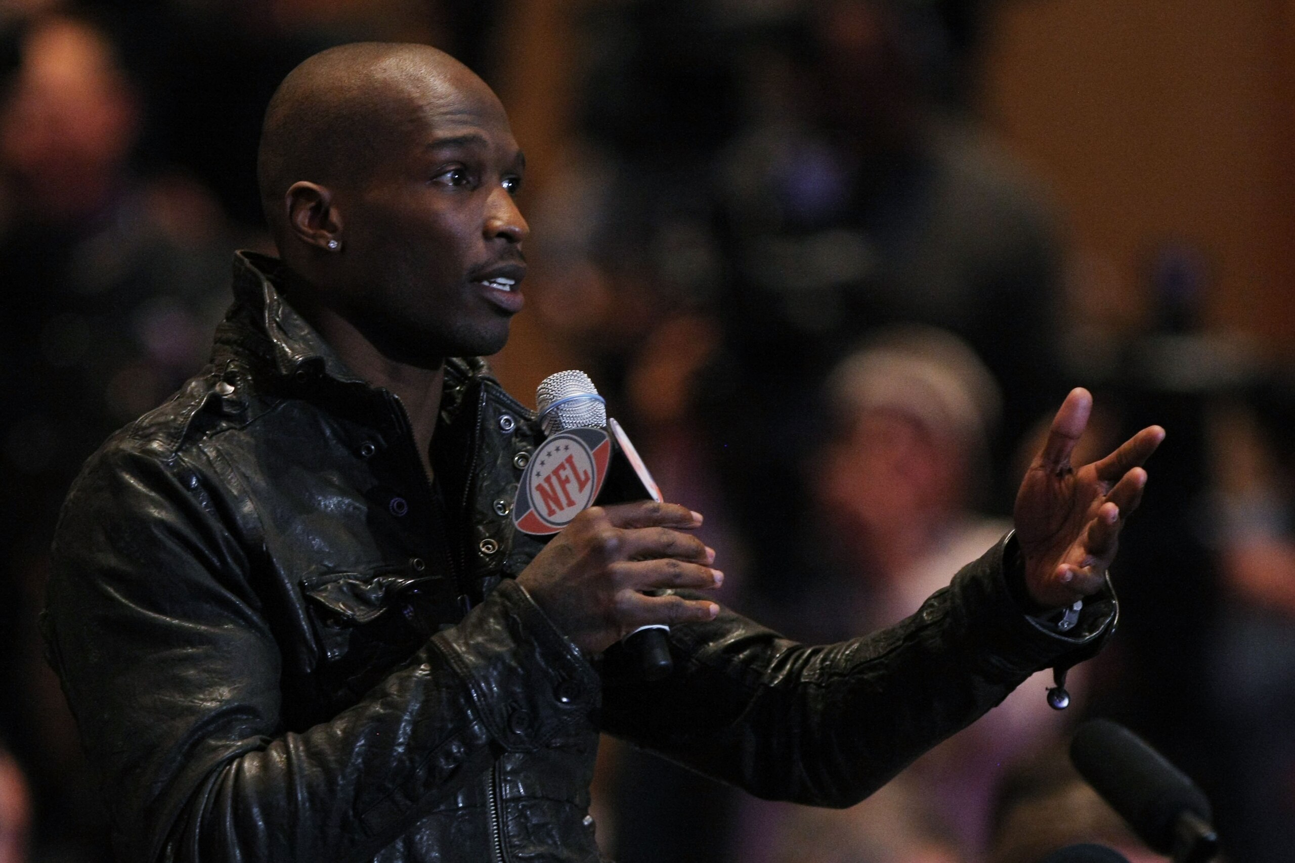 DALLAS, TX - FEBRUARY 04: Chad Ochocinco of the Cincinnati Bengals asks NFL commissioner Roger Goodell a question during a press conference at the Super Bowl XLV media center on February 4, 2011 in Dallas, Texas. The Green Bay Packers will play the Pitts DALLAS, TX - FEBRUARY 04: Chad Ochocinco of the Cincinnati Bengals asks NFL commissioner Roger Goodell a question during a press conference at the Super Bowl XLV media center on February 4, 2011 in Dallas, Texas. The Green Bay Packers will play the Pitts