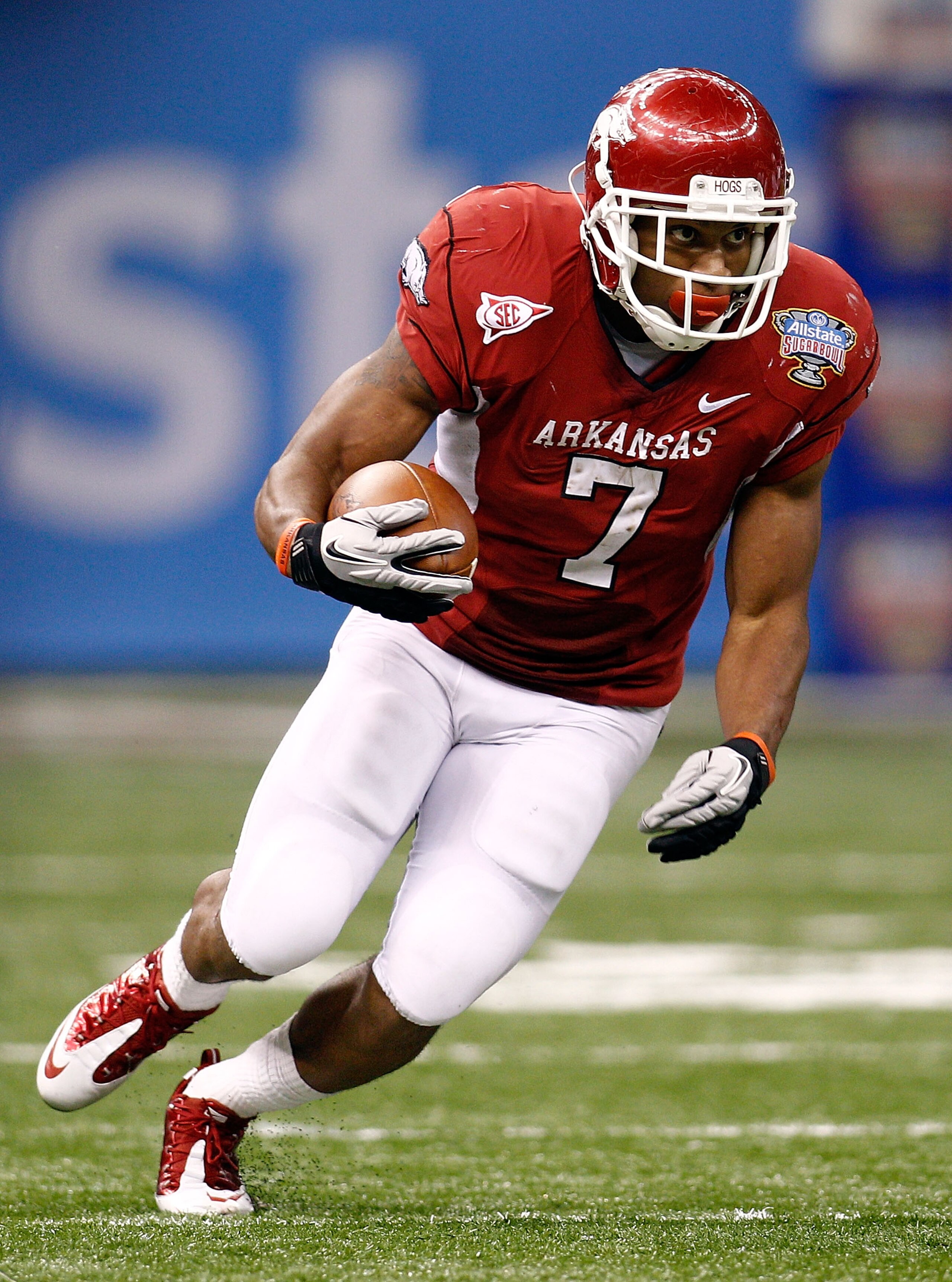 NEW ORLEANS, LA - JANUARY 04: Knile Davis #7 of the Arkansas Razorbacks runs the ball against the Ohio State Buckeyes during the Allstate Sugar Bowl at the Louisiana Superdome on January 4, 2011 in New Orleans, Louisiana. (Photo by Chris Graythen/Getty NEW ORLEANS, LA - JANUARY 04: Knile Davis #7 of the Arkansas Razorbacks runs the ball against the Ohio State Buckeyes during the Allstate Sugar Bowl at the Louisiana Superdome on January 4, 2011 in New Orleans, Louisiana. (Photo by Chris Graythen/Getty
