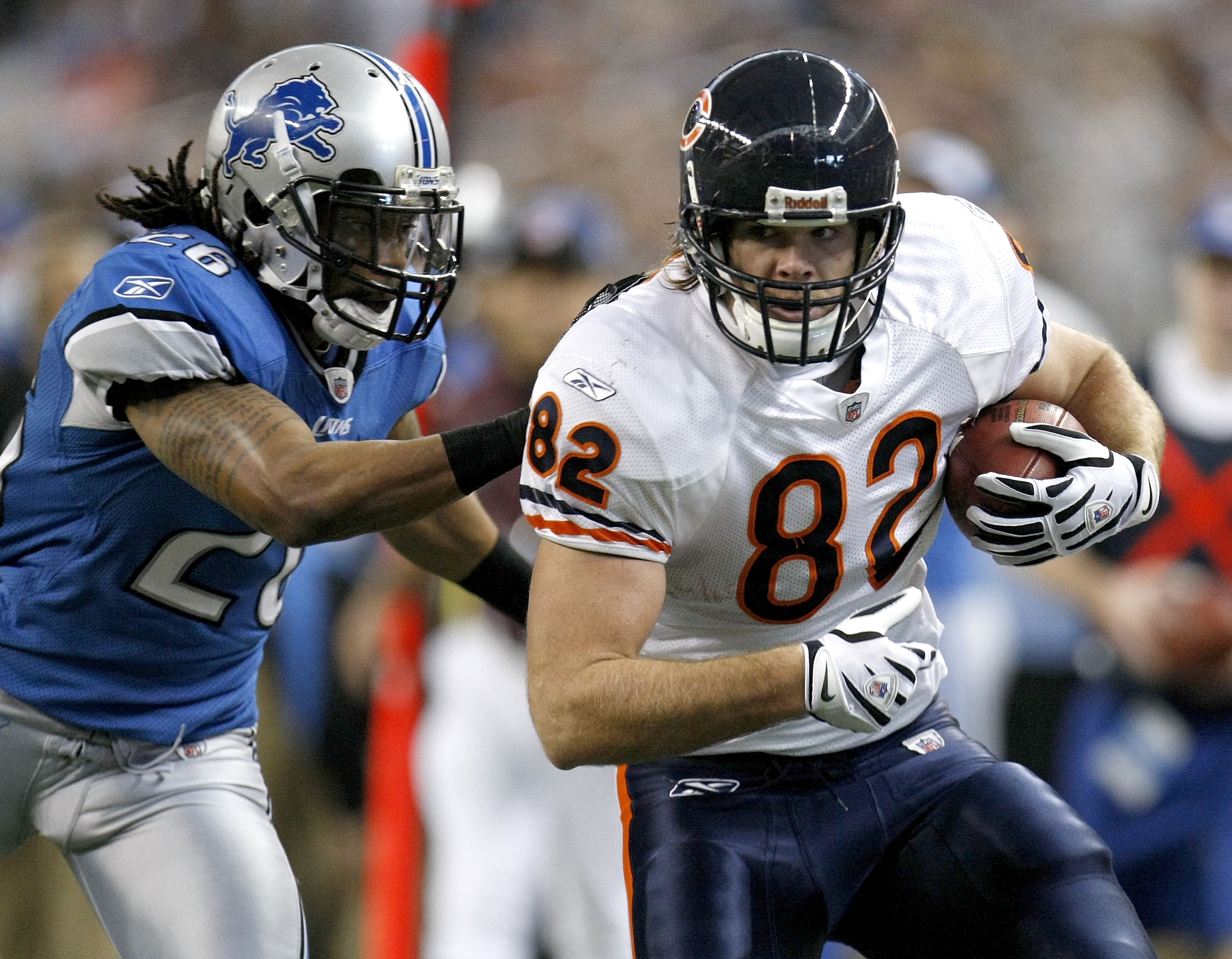 DETROIT - JANUARY 03: Greg Olson #82 of the Chicago Bears tries to get around Louis Delmas #26 of the Detroit Lions after a second quarter catch on January 3, 2010 at Ford Field in Detroit, Michigan. (Photo by Gregory Shamus/Getty Images) DETROIT - JANUARY 03: Greg Olson #82 of the Chicago Bears tries to get around Louis Delmas #26 of the Detroit Lions after a second quarter catch on January 3, 2010 at Ford Field in Detroit, Michigan. (Photo by Gregory Shamus/Getty Images)
