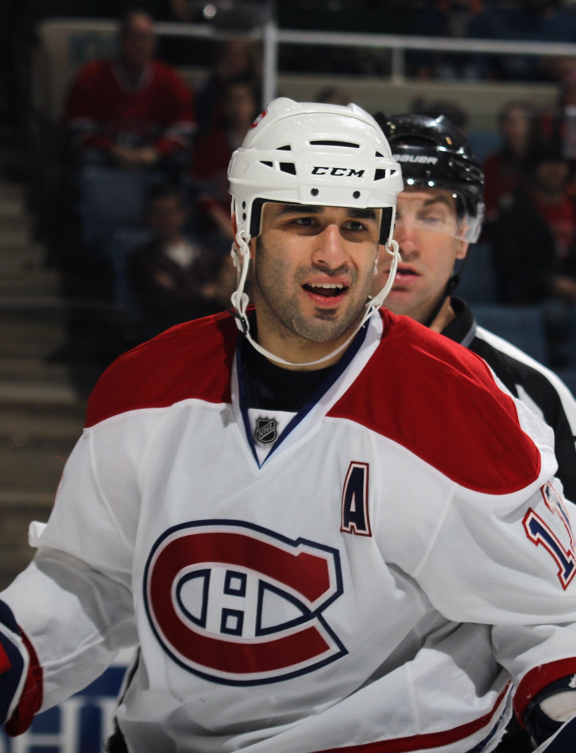 UNIONDALE, NY - DECEMBER 26:  Scott Gomez #11 of the Montreal Canadiens skates against the New York Islanders at the Nassau Coliseum on December 26, 2010 in Uniondale, New York. The Islanders defeated the Canadiens 4-1.  (Photo by Bruce Bennett/Getty Imag