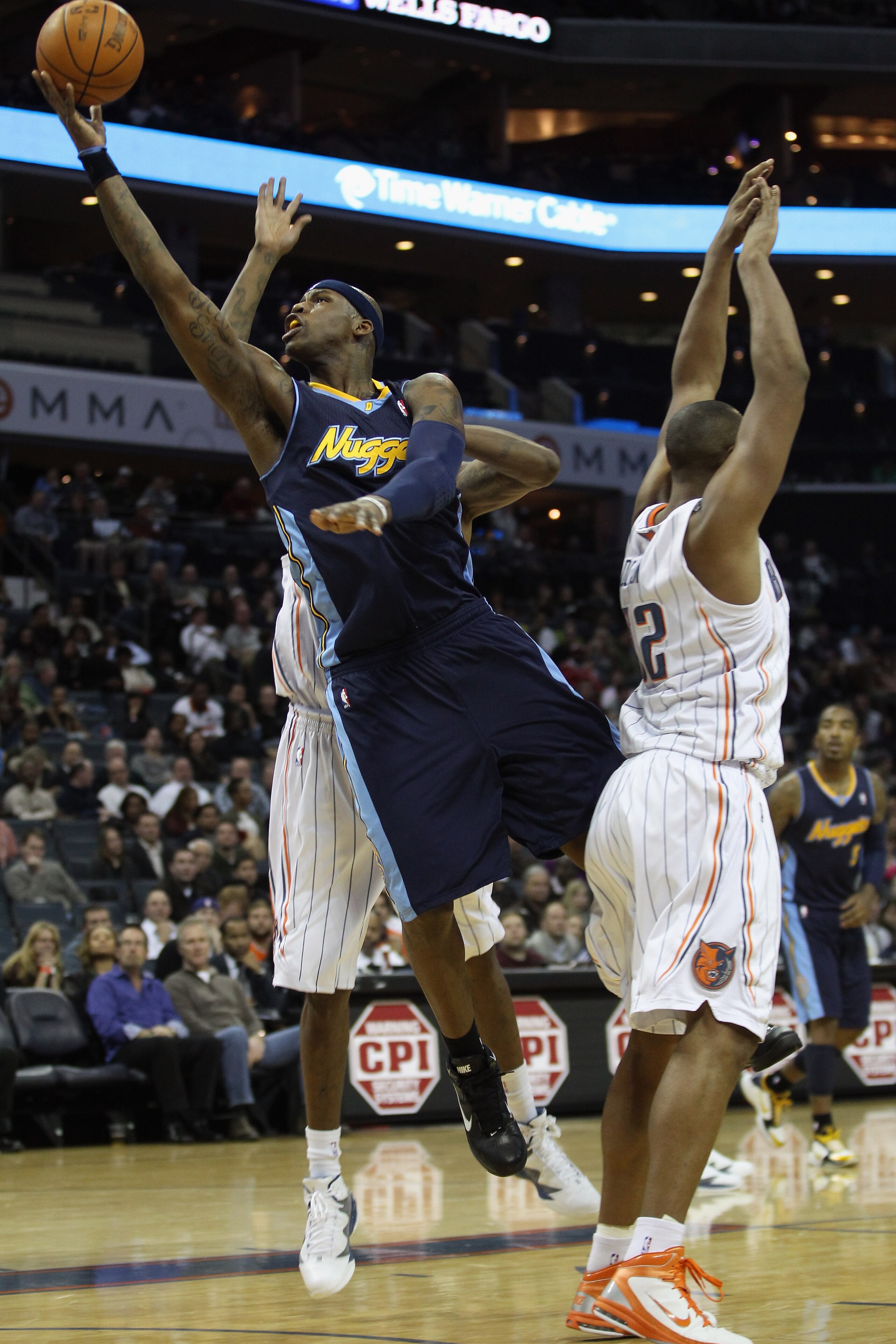 CHARLOTTE, NC - DECEMBER 07: Al Harrington #7 of the Denver Nuggets against the Charlotte Bobcats during their game at Time Warner Cable Arena on December 7, 2010 in Charlotte, North Carolina. NOTE TO USER: User expressly acknowledges and agrees that, b CHARLOTTE, NC - DECEMBER 07: Al Harrington #7 of the Denver Nuggets against the Charlotte Bobcats during their game at Time Warner Cable Arena on December 7, 2010 in Charlotte, North Carolina. NOTE TO USER: User expressly acknowledges and agrees that, b