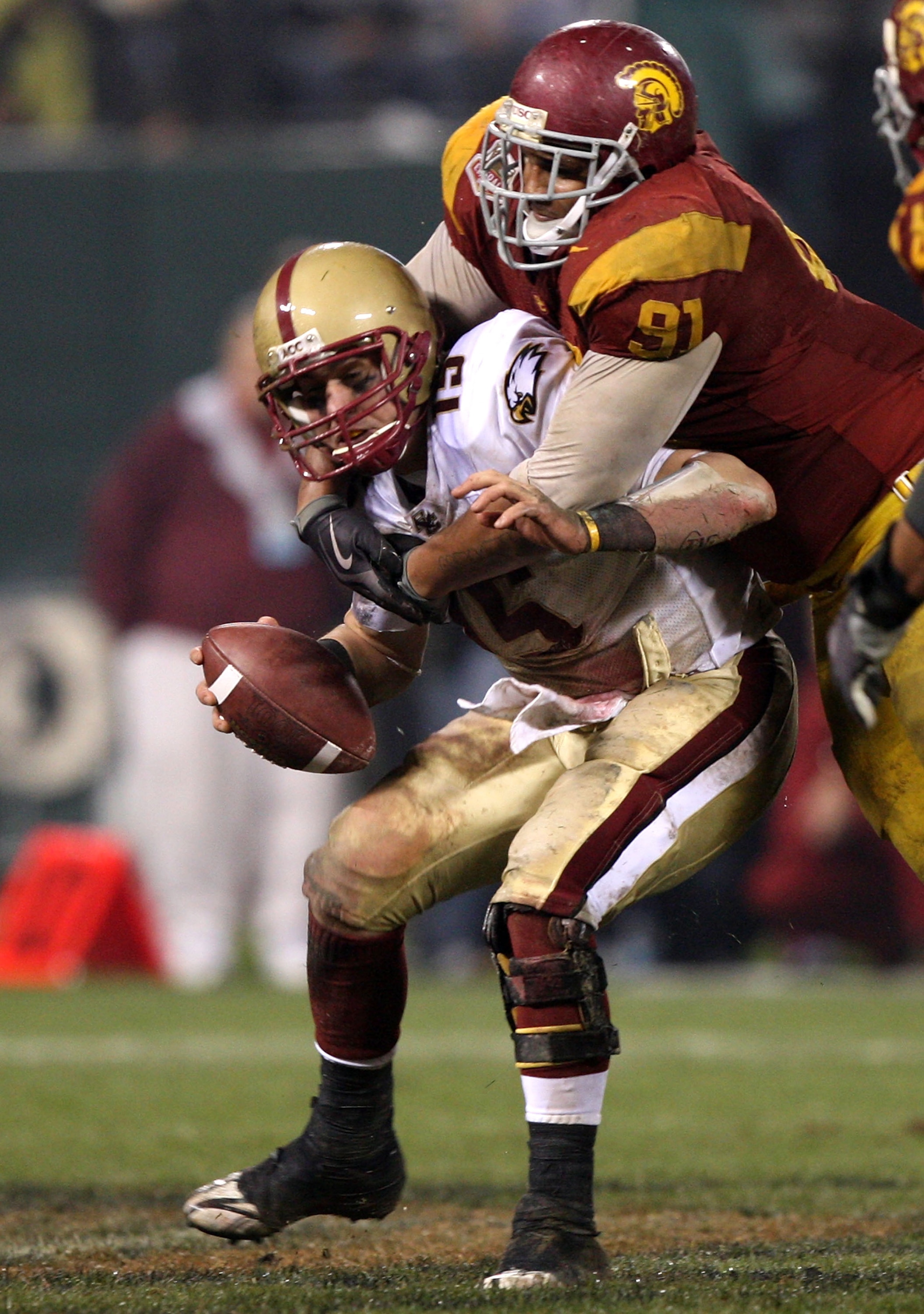 SAN FRANCISCO - DECEMBER 26: Dave Shinskie #15 of the Boston College Eagles is sacked by Jurrell Casey #91 of the USC Trojans during the 2009 Emerald Bowl at AT&T Park on December 26, 2009 in San Francisco, California. (Photo by Jed Jacobsohn/Getty Images SAN FRANCISCO - DECEMBER 26: Dave Shinskie #15 of the Boston College Eagles is sacked by Jurrell Casey #91 of the USC Trojans during the 2009 Emerald Bowl at AT&T Park on December 26, 2009 in San Francisco, California. (Photo by Jed Jacobsohn/Getty Images