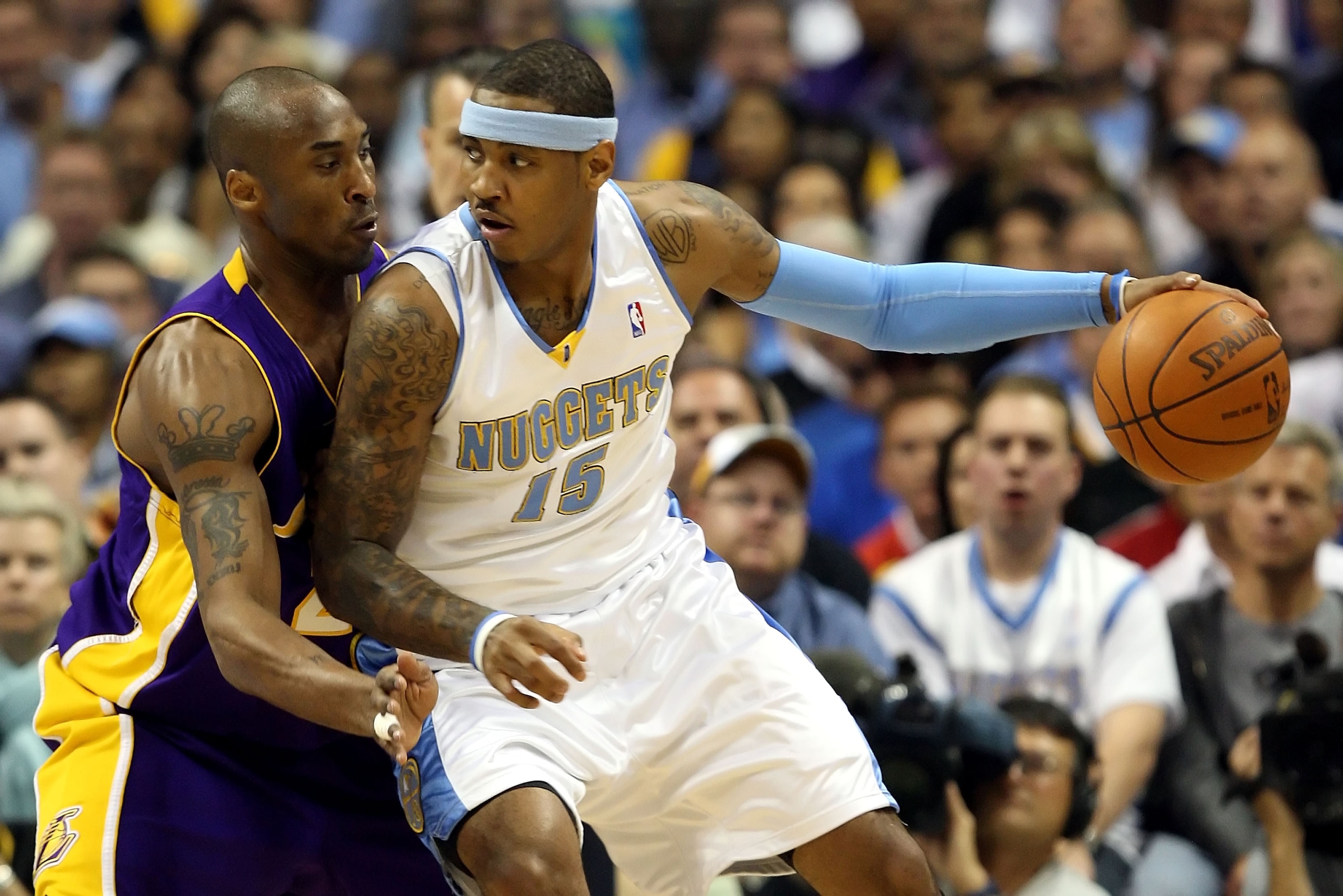 DENVER - MAY 25:  Carmelo Anthony #15 of the Denver Nuggets posts up Kobe Bryant #24 of the Los Angeles Lakers in the first quarter of Game Four of the Western Conference Finals during the 2009 NBA Playoffs at Pepsi Center on May 25, 2009 in Denver, Color