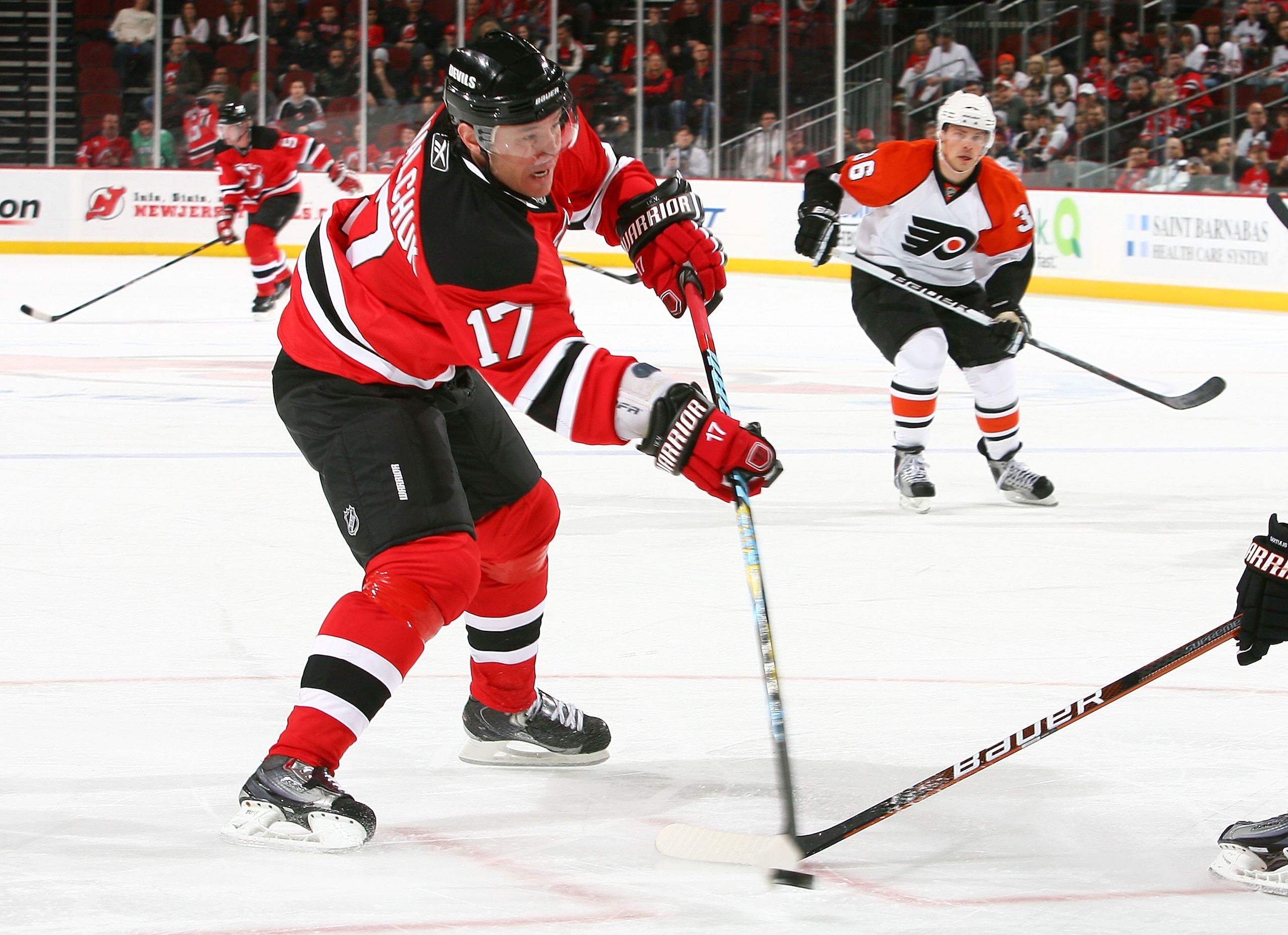 NEWARK, NJ - FEBRUARY 10: IIya Kovalchuk #17 of the New Jersey Devils fires the puck towards the net agaisnt the Philadelphia Flyers at the Prudential Center on February 10, 2010 in Newark, New Jersey. Flyers defeated the Devils 3-2 in overtime (Photo b NEWARK, NJ - FEBRUARY 10: IIya Kovalchuk #17 of the New Jersey Devils fires the puck towards the net agaisnt the Philadelphia Flyers at the Prudential Center on February 10, 2010 in Newark, New Jersey. Flyers defeated the Devils 3-2 in overtime (Photo b