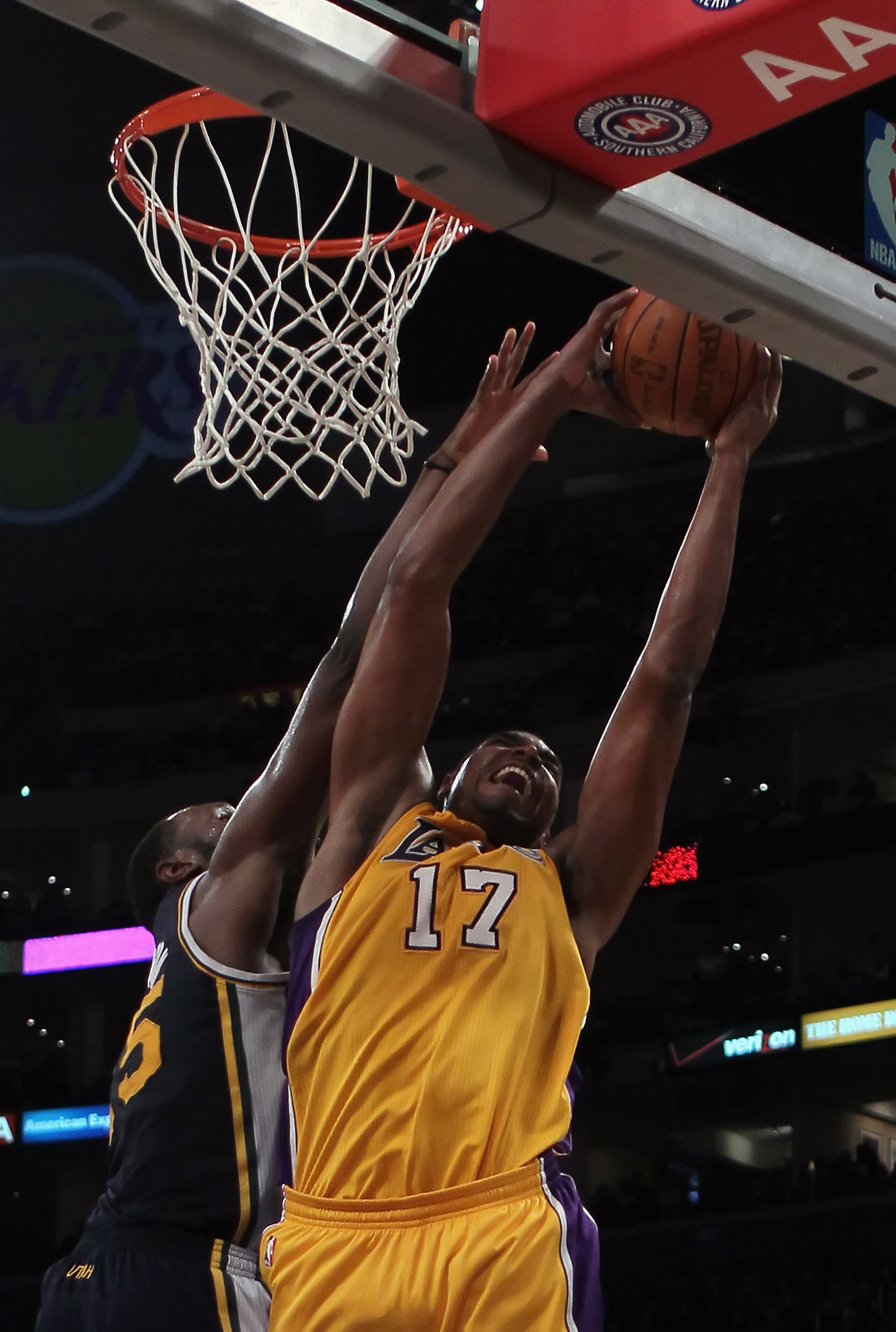 LOS ANGELES, CA - JANUARY 25: Andrew Bynum #17 of the Los Angeles Lakers drives to the basket while being defended by Al Jefferson #25 of the Utah Jazz in the second half at Staples Center on January 25, 2011 in Los Angeles, California. The Lakers defeat LOS ANGELES, CA - JANUARY 25: Andrew Bynum #17 of the Los Angeles Lakers drives to the basket while being defended by Al Jefferson #25 of the Utah Jazz in the second half at Staples Center on January 25, 2011 in Los Angeles, California. The Lakers defeat