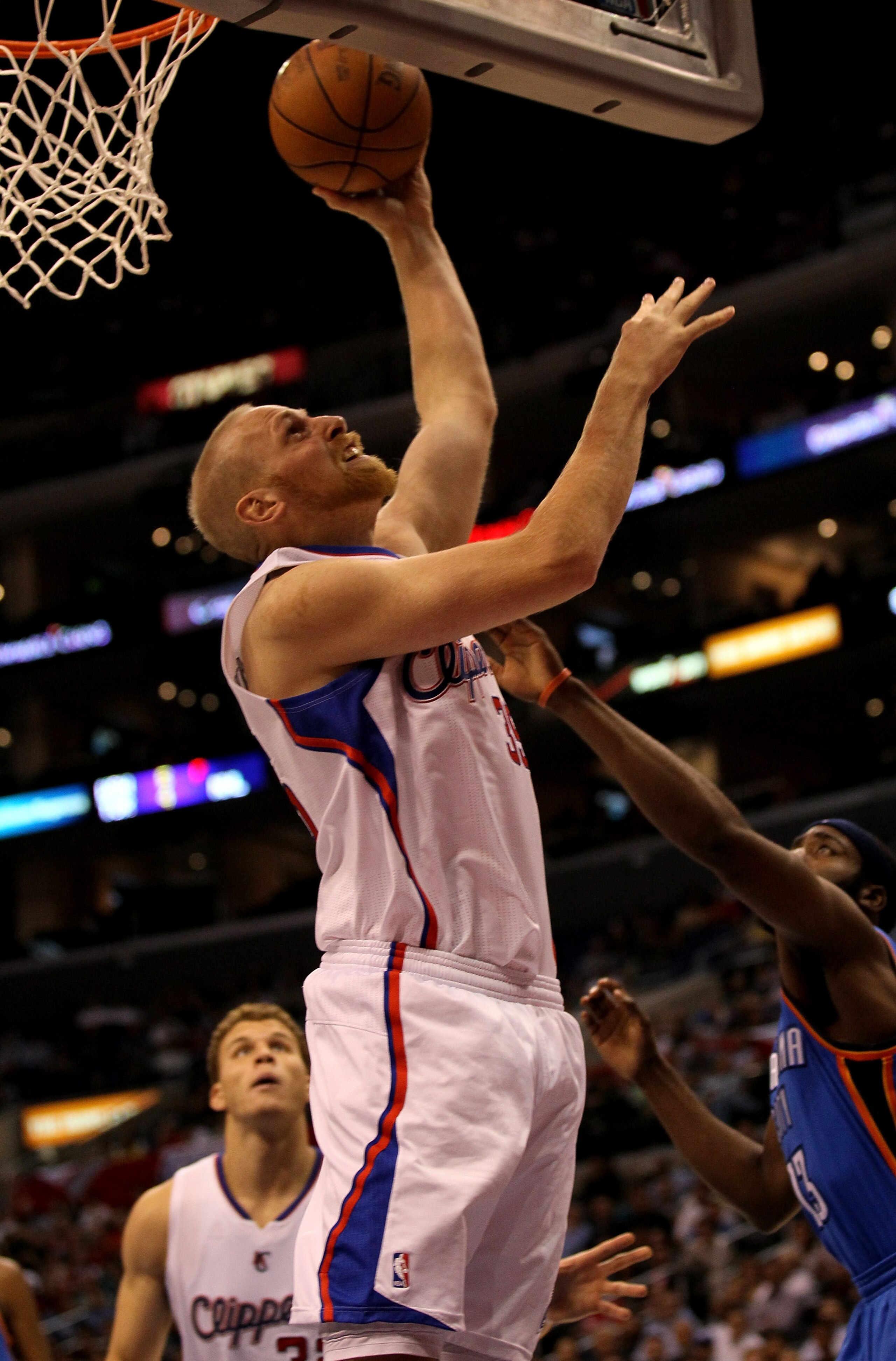 LOS ANGELES - NOVEMBER 3: Chris Kaman #35 of the Los Angeles Clippers shoots against the Oklahoma City Thunder at Staples Center on November 3, 2010 in Los Angeles, California. The Clippers won 107-92. NOTE TO USER: User expressly acknowledges and agrees LOS ANGELES - NOVEMBER 3: Chris Kaman #35 of the Los Angeles Clippers shoots against the Oklahoma City Thunder at Staples Center on November 3, 2010 in Los Angeles, California. The Clippers won 107-92. NOTE TO USER: User expressly acknowledges and agrees