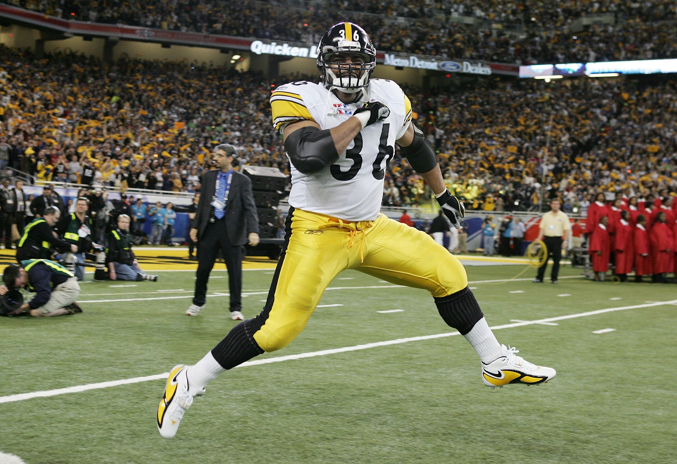 DETROIT - FEBRUARY 05:  Running back Jerome Bettis #36 of the Pittsburgh Steelers runs out onto the field first as his team is introduced before the start of Super Bowl XL against the Seattle Seahawks at Ford Field on February 5, 2006 in Detroit, Michigan