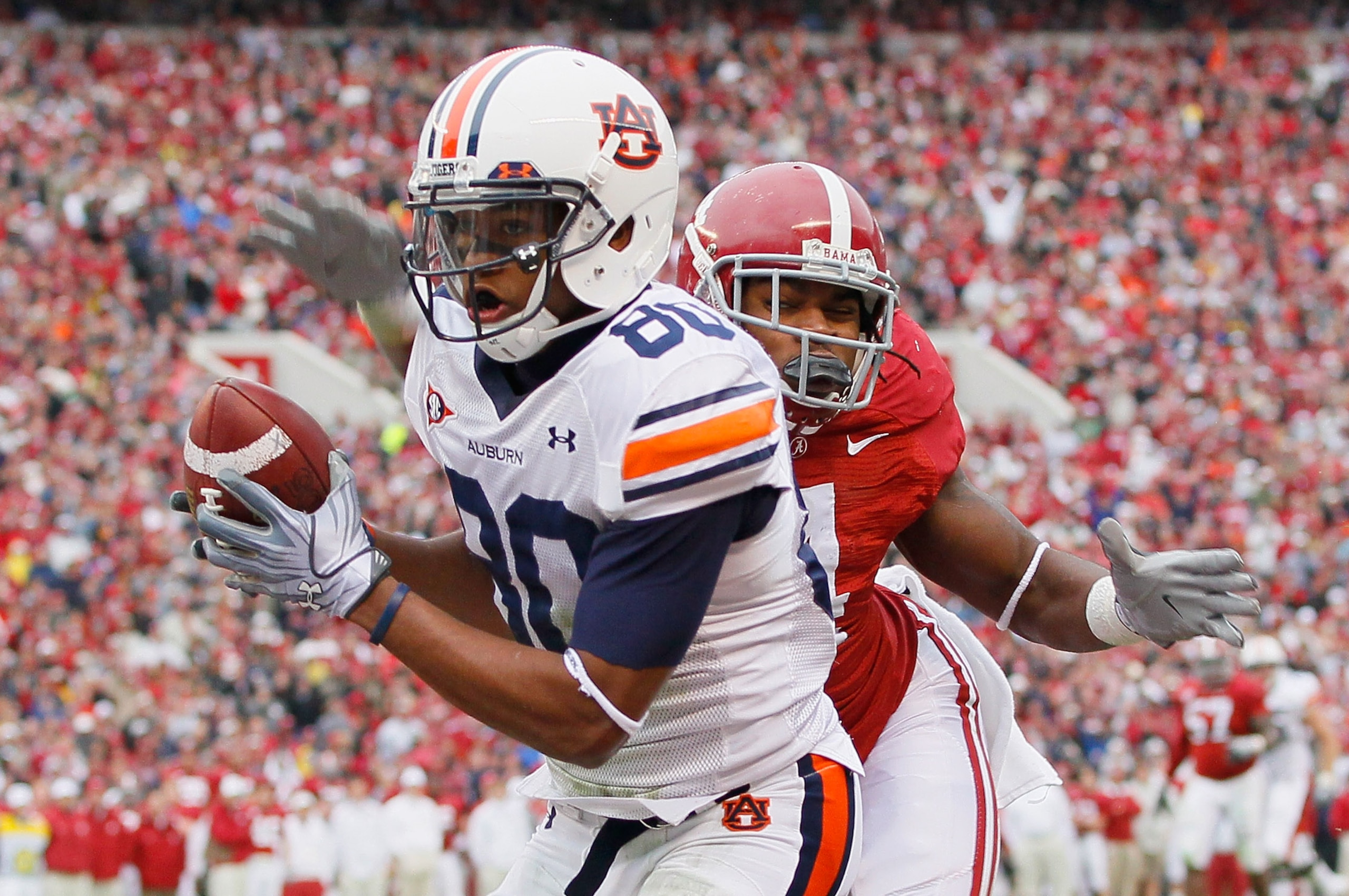 TUSCALOOSA, AL - NOVEMBER 26: Emory Blake #80 of the Auburn Tigers pulls in this touchdown against Mark Barron #4 of the Alabama Crimson Tide at Bryant-Denny Stadium on November 26, 2010 in Tuscaloosa, Alabama. (Photo by Kevin C. Cox/Getty Images) TUSCALOOSA, AL - NOVEMBER 26: Emory Blake #80 of the Auburn Tigers pulls in this touchdown against Mark Barron #4 of the Alabama Crimson Tide at Bryant-Denny Stadium on November 26, 2010 in Tuscaloosa, Alabama. (Photo by Kevin C. Cox/Getty Images)