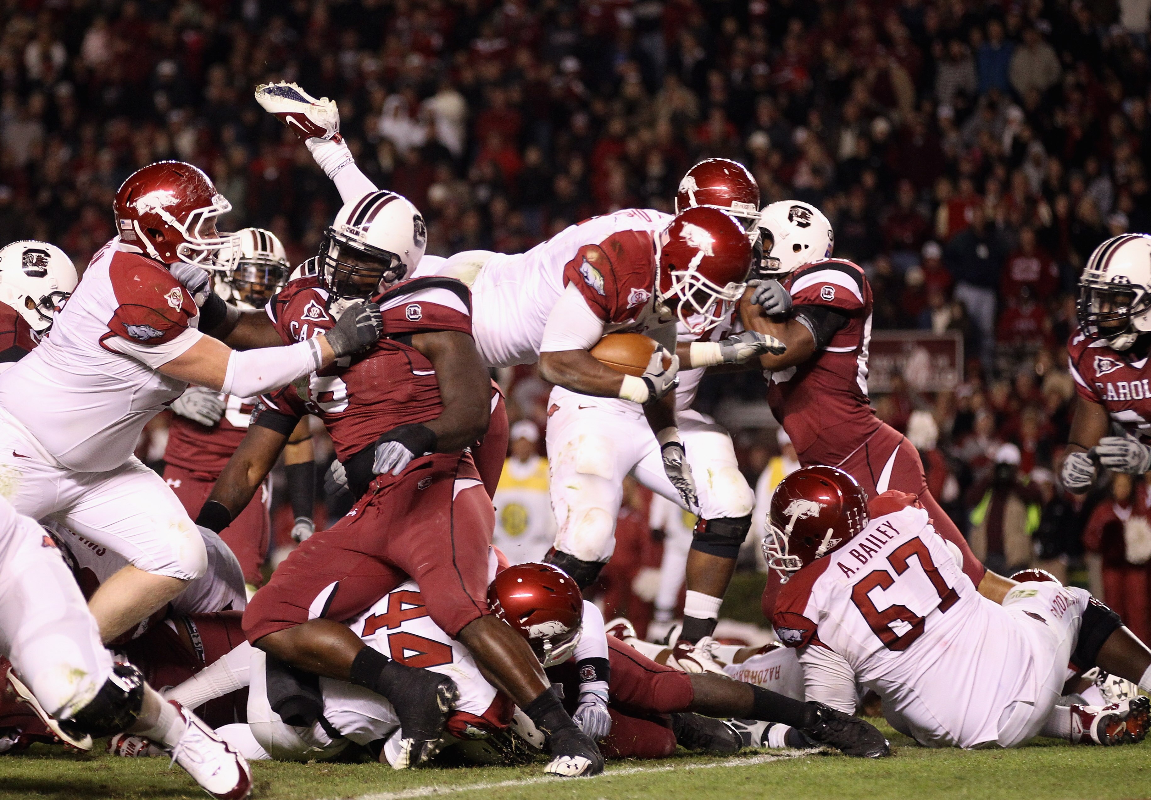COLUMBIA, SC - NOVEMBER 06:  Knile Davis #7 of the Arkansas Razorbacks dives for a touchdown against the South Carolina Gamecocks during their game at Williams-Brice Stadium on November 6, 2010 in Columbia, South Carolina.  (Photo by Streeter Lecka/Getty 