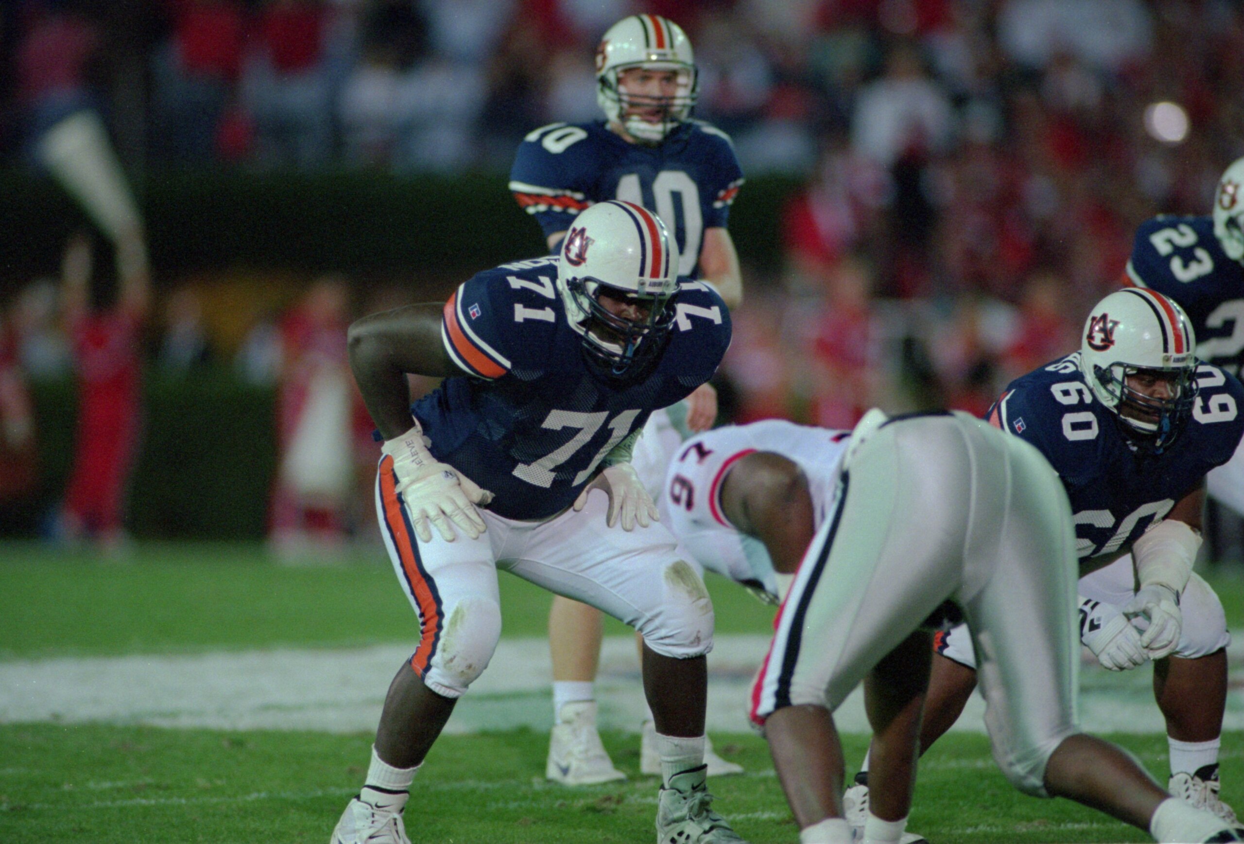 12 Nov 1994: Offensive Tackle Willie Anderson #71 of Auburn University awaits the snap during the Tigers 23-23 tie with the University of Georgia in Auburn, Alabama. 12 Nov 1994: Offensive Tackle Willie Anderson #71 of Auburn University awaits the snap during the Tigers 23-23 tie with the University of Georgia in Auburn, Alabama.