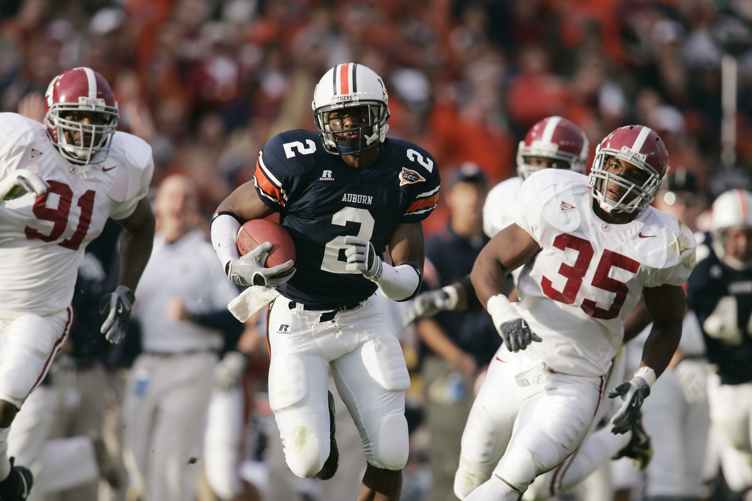AUBURN, AL - NOVEMBER 19: Wide receiver Ben Obomanu #2 of the Auburn Tigers carries the ball against the Alabama Crimson Tide at Jordan-Hare Stadium on November 19, 2005 in Auburn, Alabama. Auburn defeated Alabama 28-18. (Photo by Chris Graythen/Getty AUBURN, AL - NOVEMBER 19: Wide receiver Ben Obomanu #2 of the Auburn Tigers carries the ball against the Alabama Crimson Tide at Jordan-Hare Stadium on November 19, 2005 in Auburn, Alabama. Auburn defeated Alabama 28-18. (Photo by Chris Graythen/Getty
