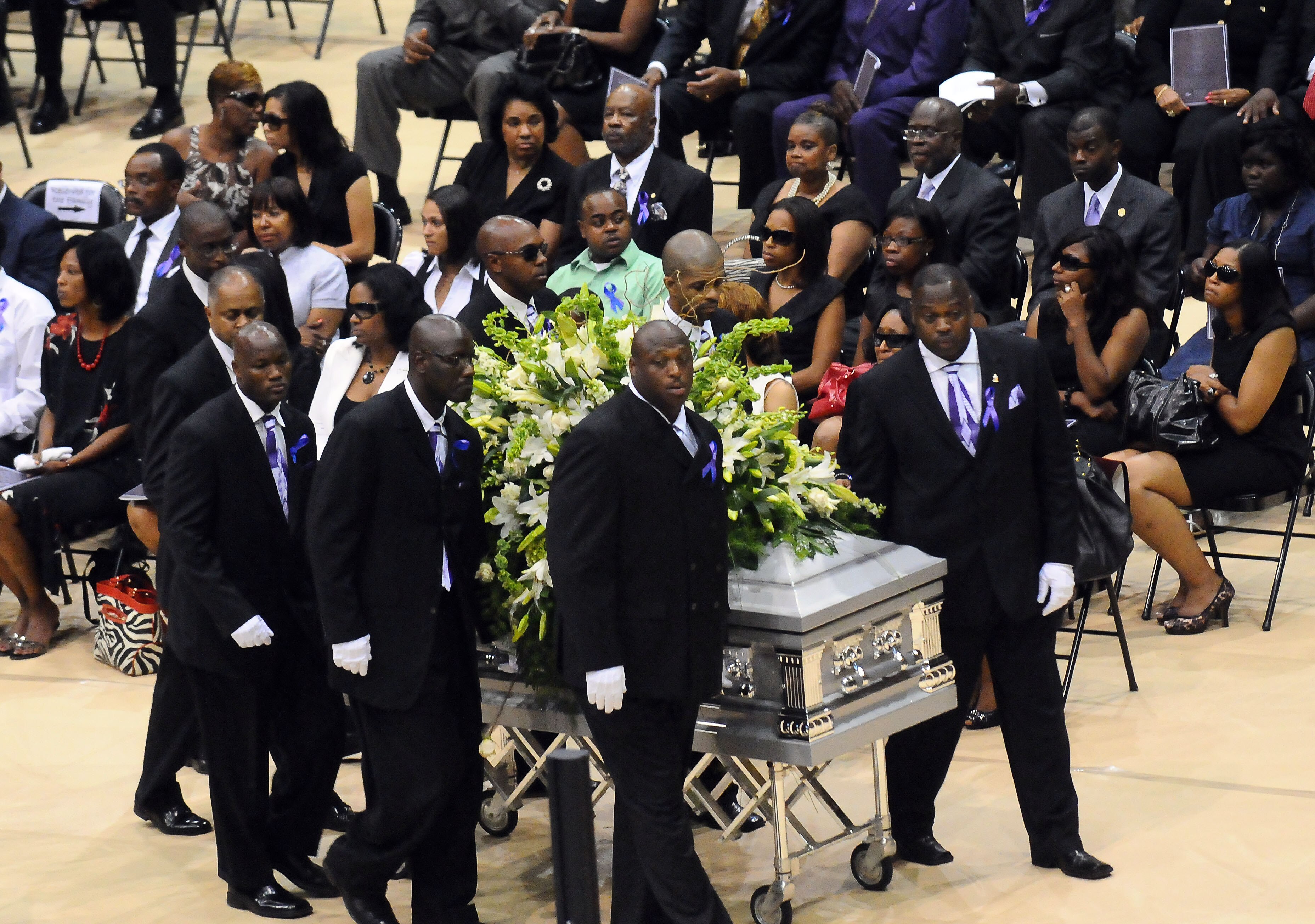 HATTIESBURG, MS - JULY 11:   Pall bearers depart the funeral service for former NFL quarterback Steve McNair on July 11, 2009 in Hattiesburg, Mississippi.  (Photo by George Clark - Hattiesburg American POOL/Getty Images)