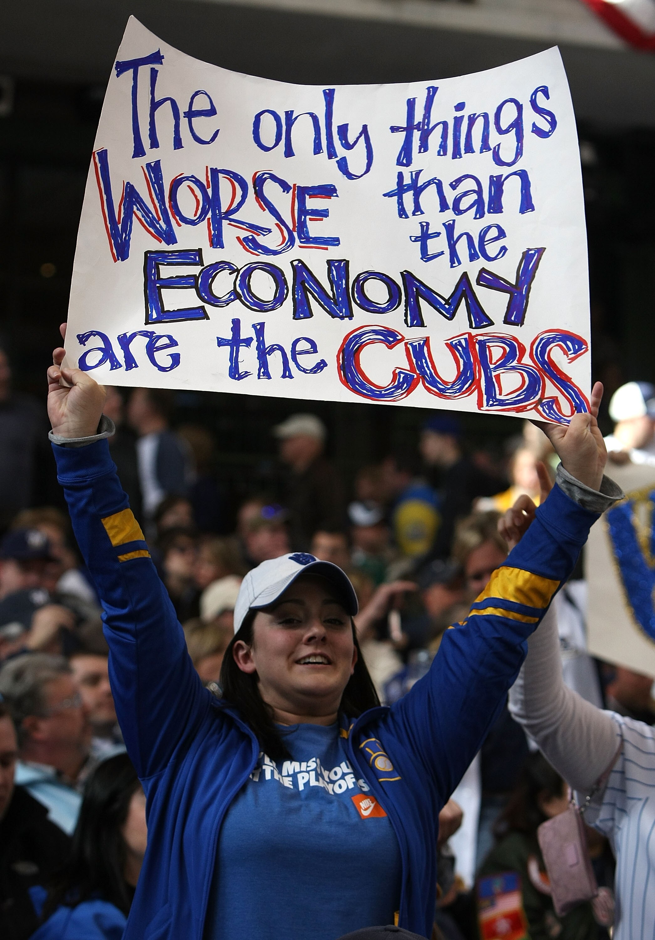 MILWAUKEE - APRIL 10: A fan of the Milwaukee Brewers holds a sign during the Opening Day game against Chicago Cubs during the Opening Day game on April 10, 2009 at Miller Park in Milwaukee, Wisconsin. (Photo byJonathan Daniel/Getty Images)