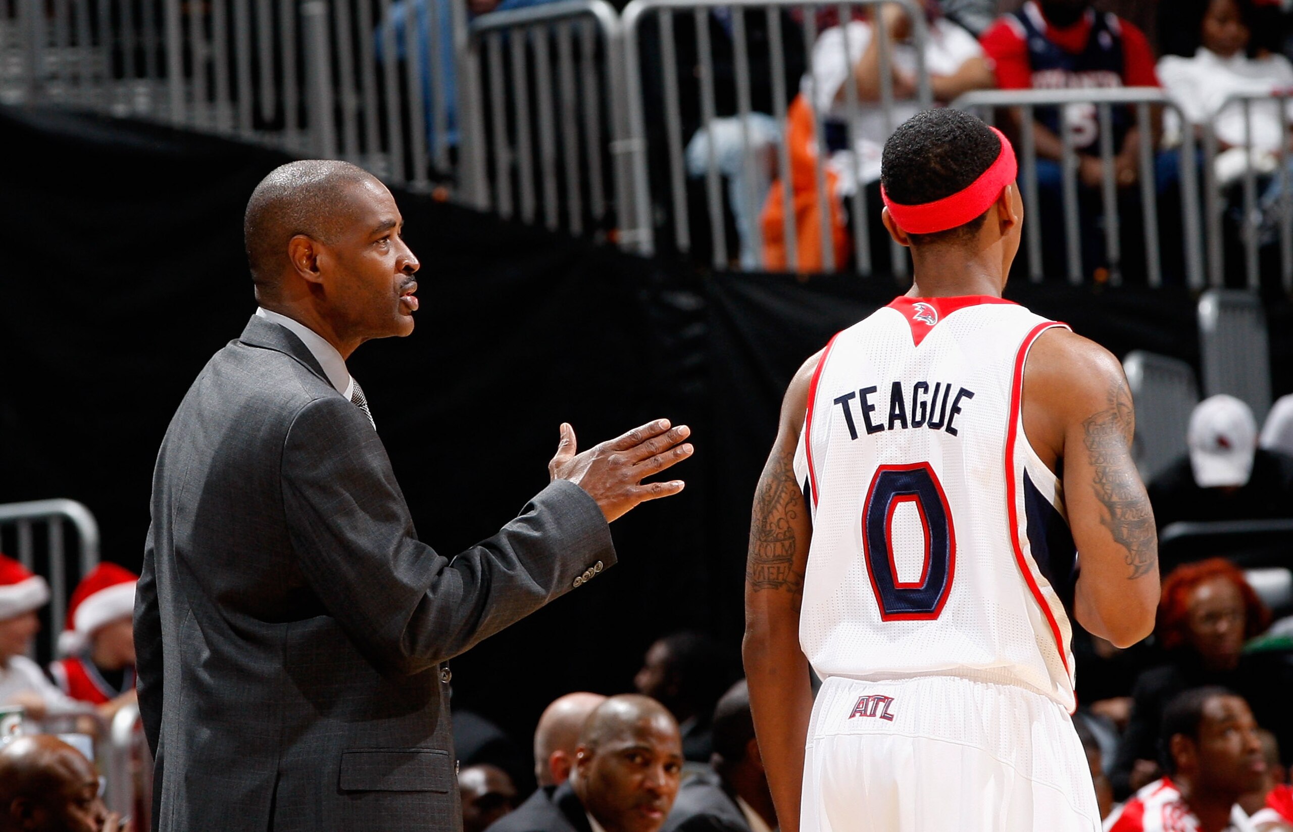 ATLANTA, GA - DECEMBER 11: Head coach Larry Drew and Jeff Teague #0 of the Atlanta Hawks against the Indiana Pacers at Philips Arena on December 11, 2010 in Atlanta, Georgia. NOTE TO USER: User expressly acknowledges and agrees that, by downloading and/ ATLANTA, GA - DECEMBER 11: Head coach Larry Drew and Jeff Teague #0 of the Atlanta Hawks against the Indiana Pacers at Philips Arena on December 11, 2010 in Atlanta, Georgia. NOTE TO USER: User expressly acknowledges and agrees that, by downloading and/