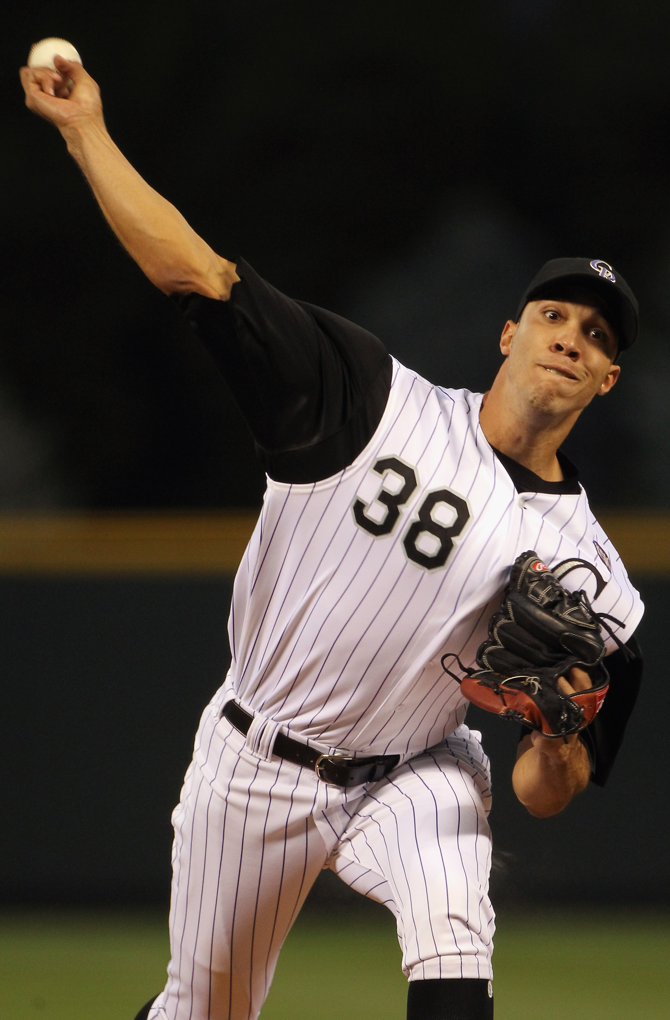 DENVER - SEPTEMBER 27:  Starting pitcher Ubaldo Jimenez #38 of the Colorado Rockies delivers against the Los Angeles Dodgers at Coors Field on September 25, 2010 in Denver, Colorado.  (Photo by Doug Pensinger/Getty Images)