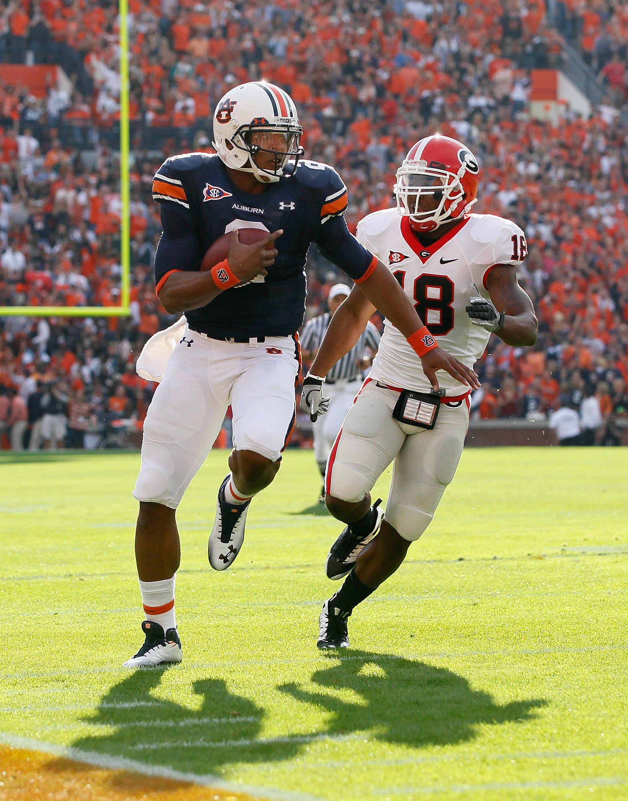 AUBURN, AL - NOVEMBER 13:  Quarterback Cam Newton #2 of the Auburn Tigers against Bacarri Rambo #18 of the Georgia Bulldogs at Jordan-Hare Stadium on November 13, 2010 in Auburn, Alabama.  (Photo by Kevin C. Cox/Getty Images)