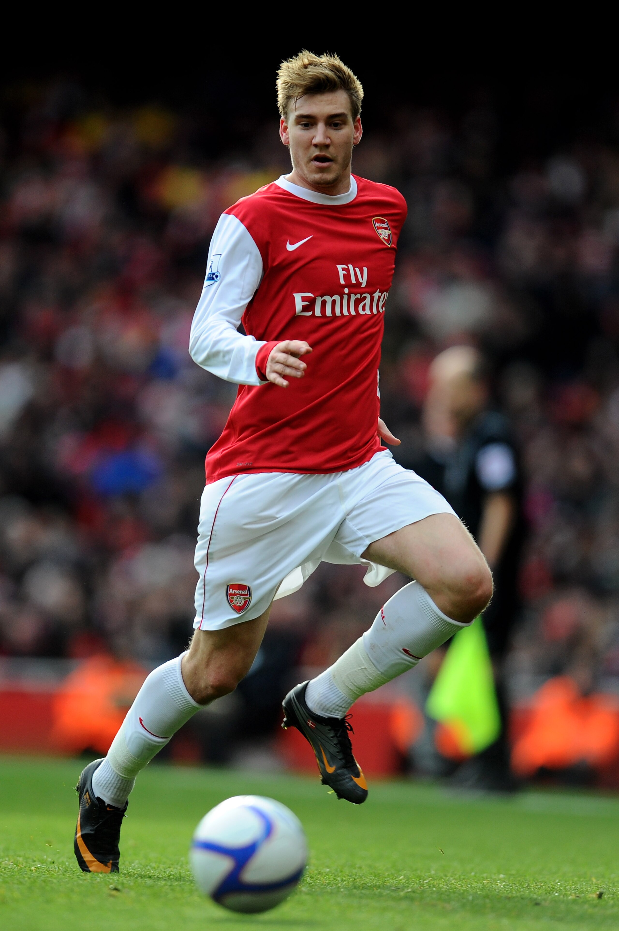 LONDON, ENGLAND - JANUARY 30:  Nicklas Bendtner of Arsenal runs with the ball during the FA Cup sponsored by E.ON fourth round match between Arsenal and Huddersfield Town at The Emirates Stadium on January 30, 2011 in London, England.  (Photo by Clive Mas