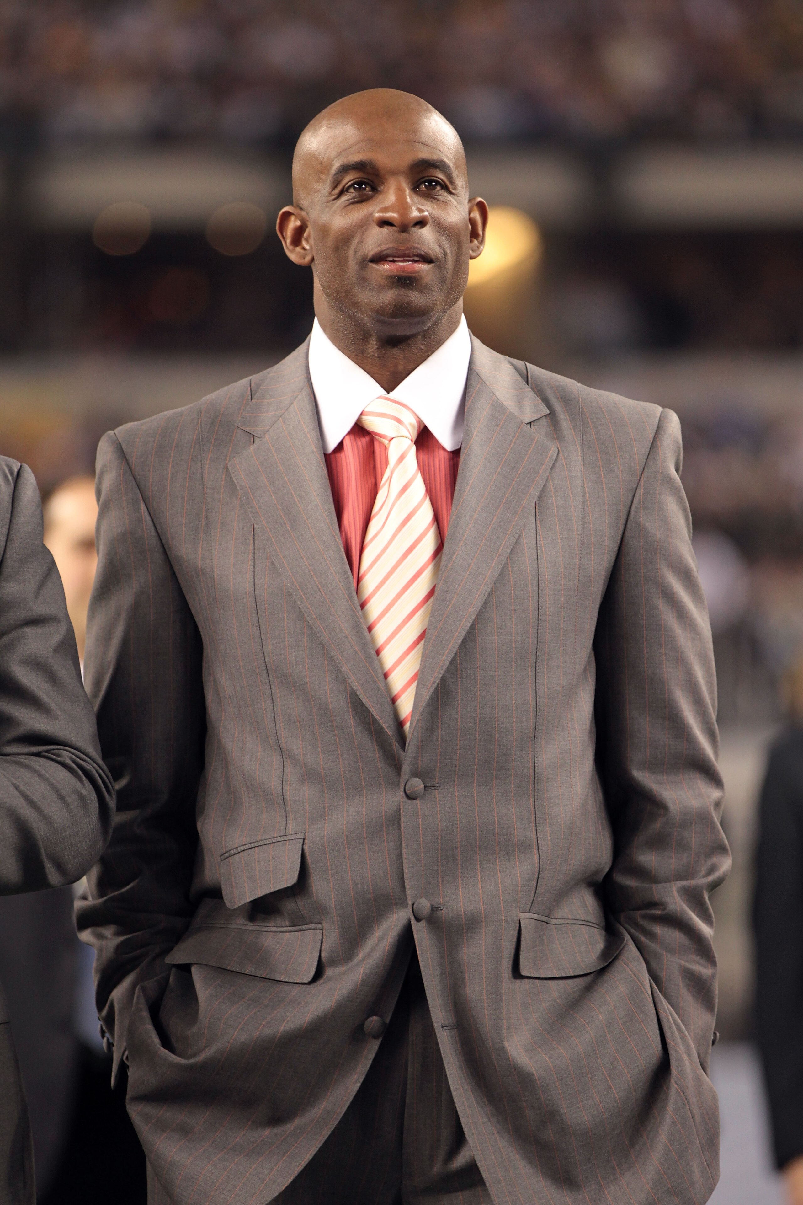 ARLINGTON, TX - FEBRUARY 06: NFL Hall of Fame Inductee Deion Sanders looks on during the coin toss prior to Super Bowl XLV at Cowboys Stadium on February 6, 2011 in Arlington, Texas. (Photo by Jamie Squire/Getty Images) ARLINGTON, TX - FEBRUARY 06: NFL Hall of Fame Inductee Deion Sanders looks on during the coin toss prior to Super Bowl XLV at Cowboys Stadium on February 6, 2011 in Arlington, Texas. (Photo by Jamie Squire/Getty Images)