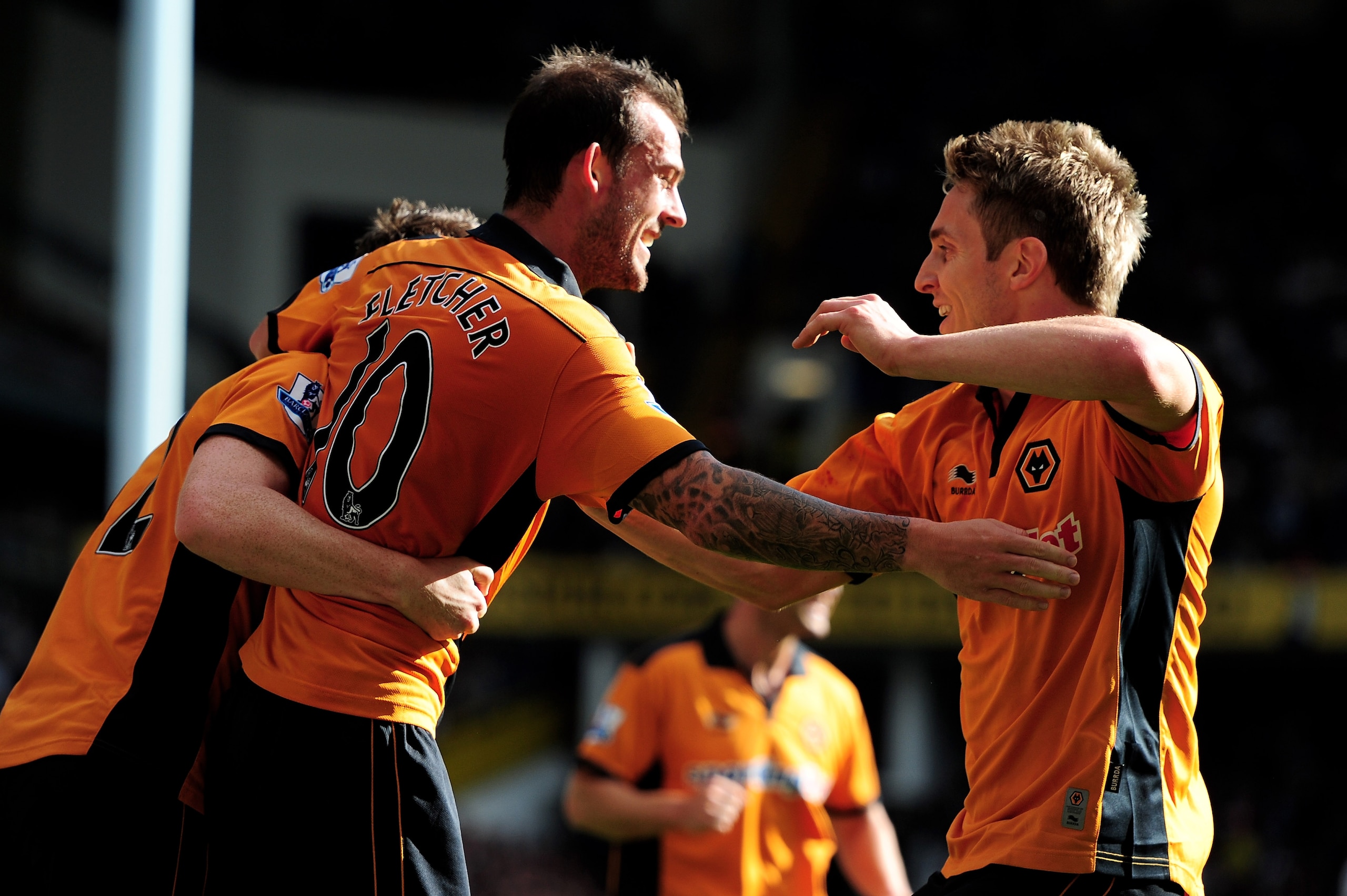 LONDON, ENGLAND - SEPTEMBER 18:  Steven Fletcher (L) of Wolves is congratulated by teammate Kevin Doyle after scoring the opening goal during the Barclays Premier League match between Tottenham Hotspur and Wolverhampton Wanderers at White Hart Lane on Sep