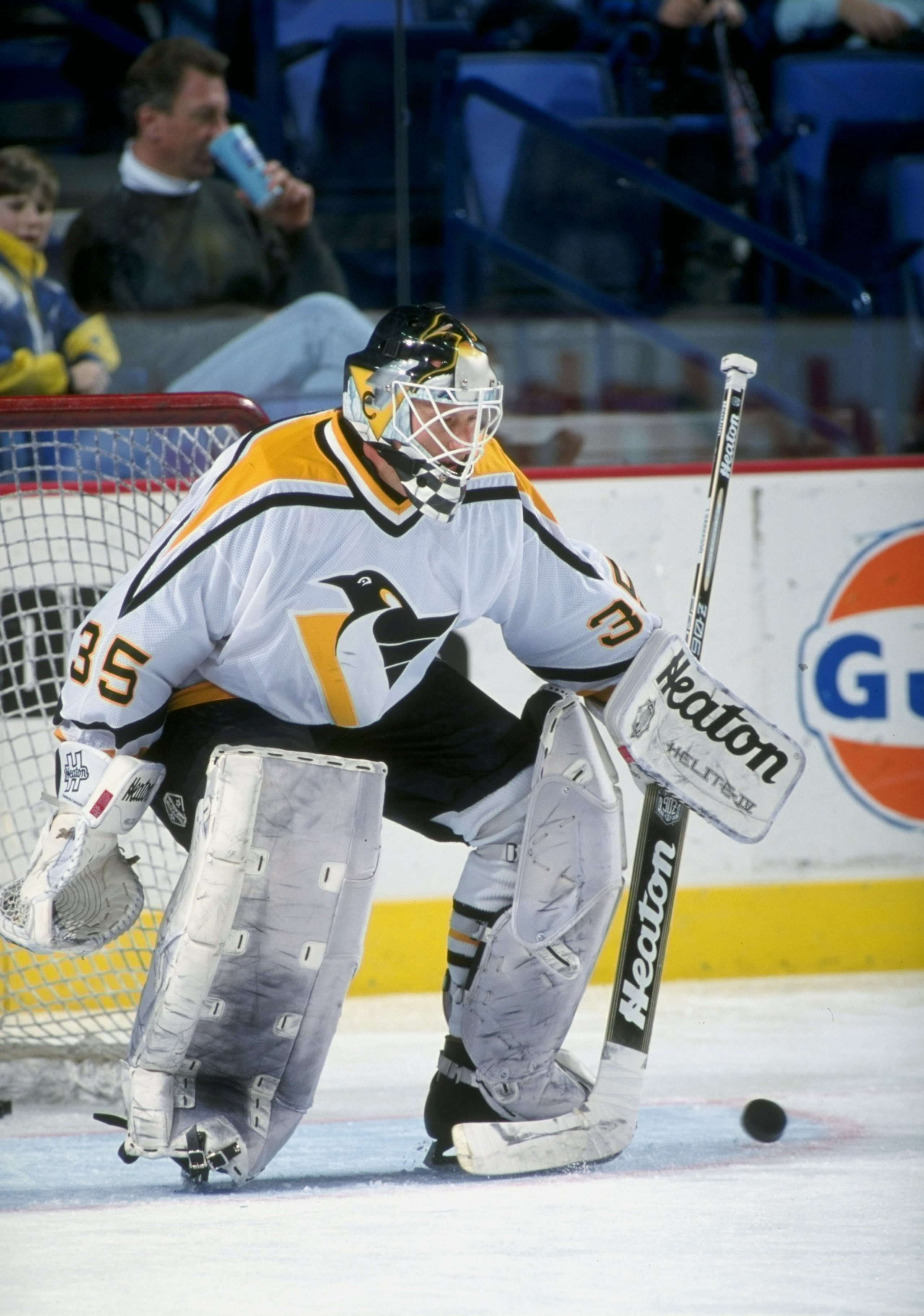 15 Mar 1998:  Goalie Tom Barrasso #35 of the Pittsburgh Penguins handles the puck during a game against the Buffalo Sabres at the Marine Midland Arena in Buffalo, New York. The Sabres defeated the Penguins  3-0. Mandatory Credit: Craig Melvin  /Allsport