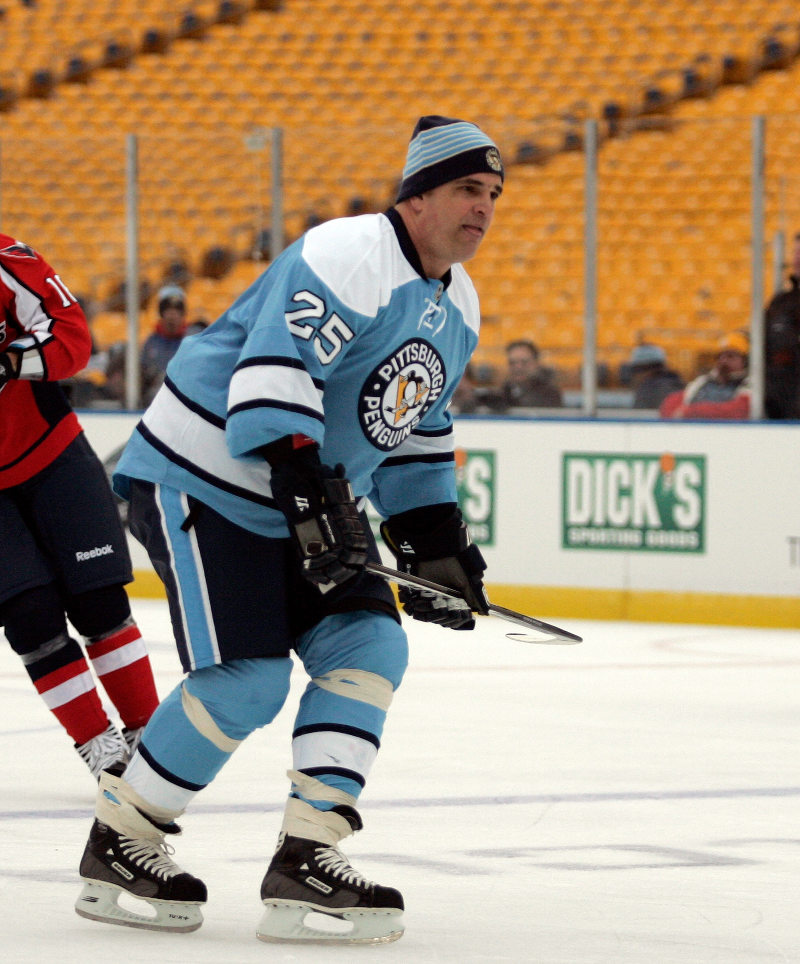 PITTSBURGH, PA - DECEMBER 31:  Kevin Stevens #25 of the Pittsburgh Penguins skates against the Washington Capitals during the 2011 NHL Winter Classic Alumni Game on December 31, 2010 at Heinz Field in Pittsburgh, Pennsylvania.  (Photo by Justin K. Aller/G