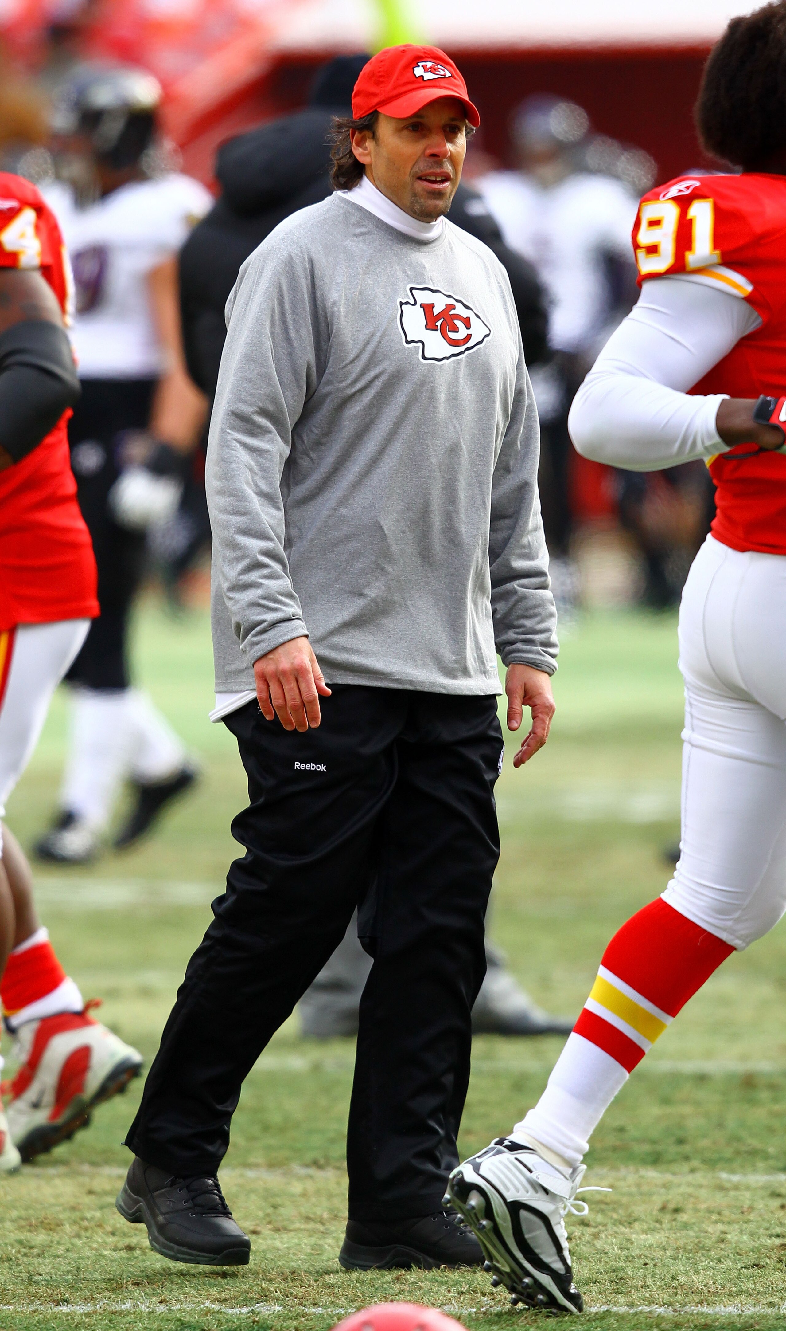 KANSAS CITY, MO - JANUARY 09:  Head coach Todd Haley of the Kansas City Chiefs looks on prior to the 2011 AFC wild card playoff game against the Baltimore Ravens at Arrowhead Stadium on January 9, 2011 in Kansas City, Missouri.  (Photo by Dilip Vishwanat/