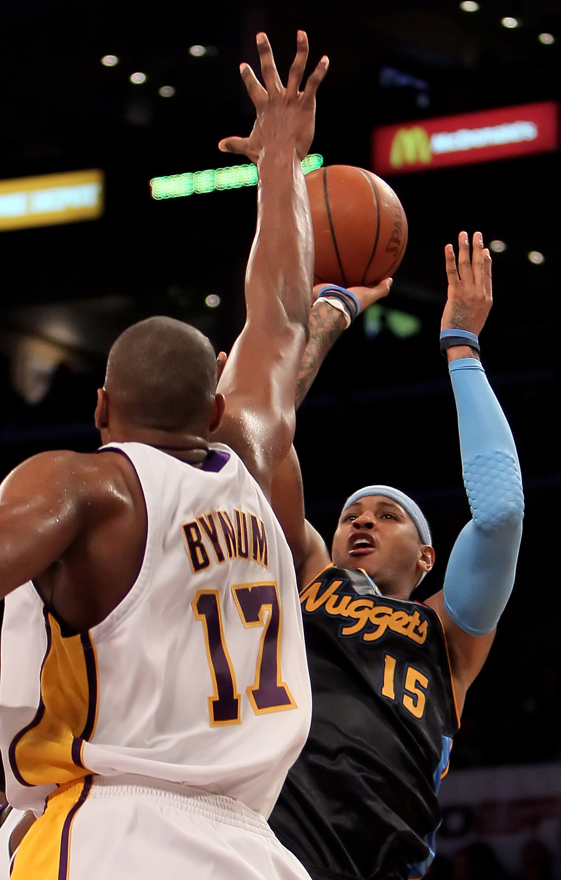 LOS ANGELES, CA - FEBRUARY 28:  Carmelo Anthony #15 of the Denver Nuggets shoots over Andrew Bynum #17 of the Los Angeles Lakers during the second half at Staples Center on February 28, 2010 in Los Angeles, California. The Lakers defeated the Nuggets 95-8