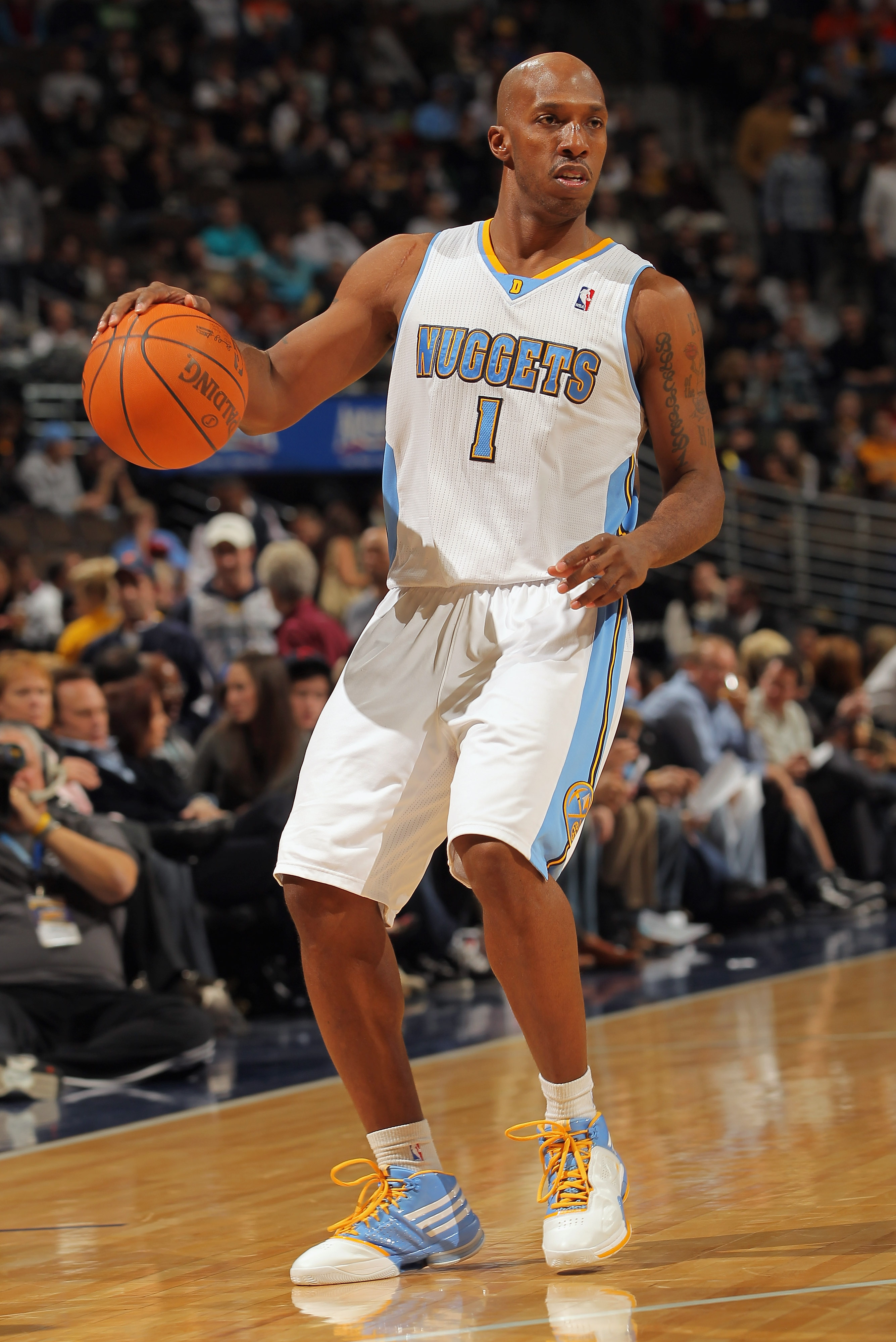 DENVER, CO - JANUARY 13:  Chauncey Billups #1 of the Denver Nuggets dribbles the ball upcourt against the Miami Heat at the Pepsi Center on January 13, 2011 in Denver, Colorado. The Nuggets defeated the Heat 130-102. NOTE TO USER: User expressly acknowled