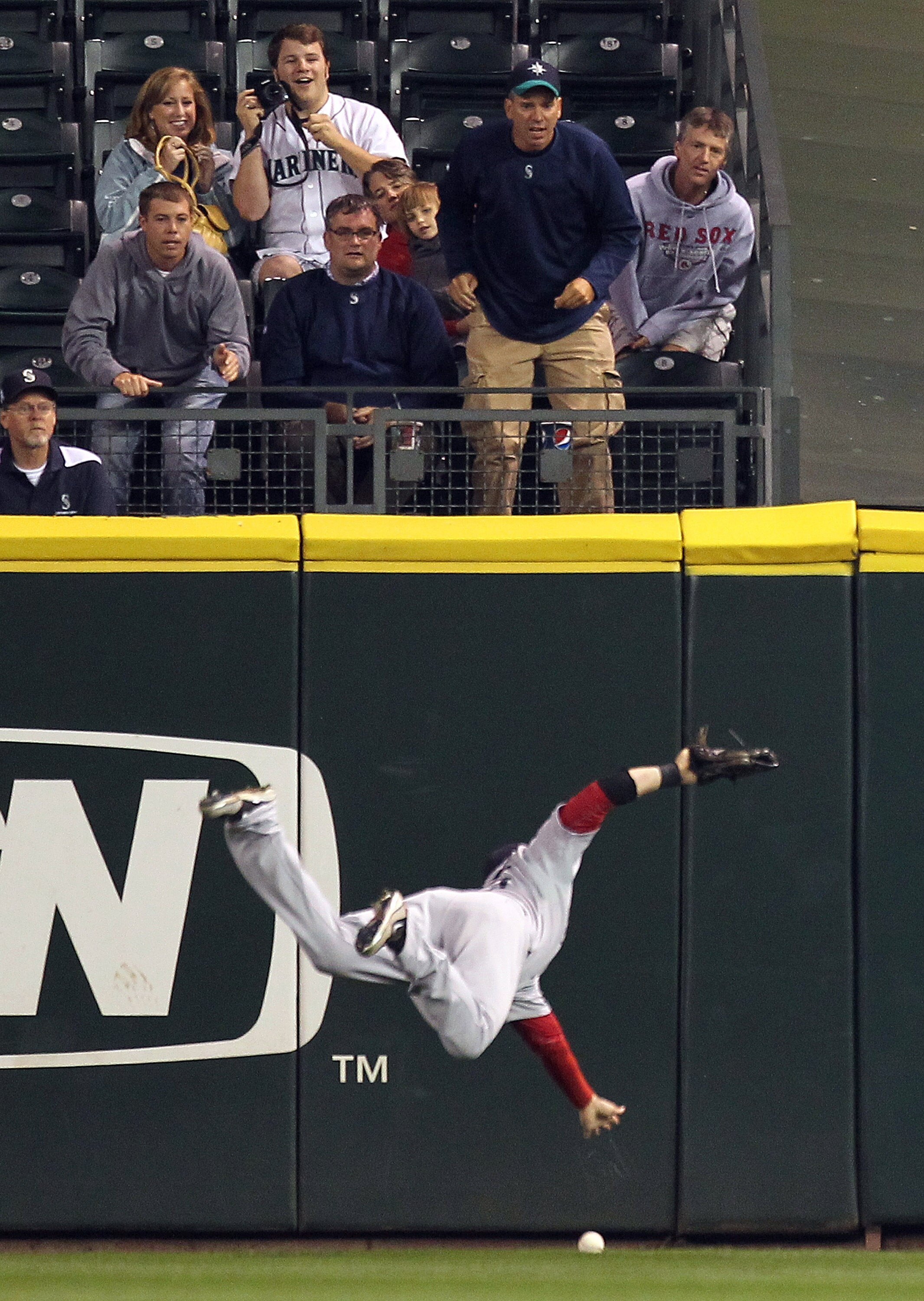SEATTLE - SEPTEMBER 14:  Center fielder Ryan Kalish #55 of the Boston Red Sox dives for a double hit by Franklin Gutierrez #21 of the Seattle Mariners at Safeco Field on September 14, 2010 in Seattle, Washington. (Photo by Otto Greule Jr/Getty Images)