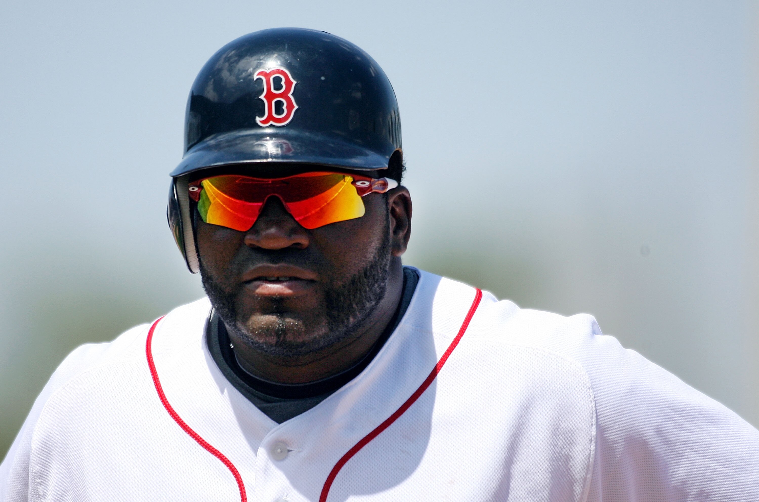 FORT MYERS, FL - MARCH 20:   David Ortiz #34 of the Boston Red Sox stands on first base after a walk  against the Baltimore Orioles on March 20, 2010 at City of Palms Park in Fort Myers, Florida.  (Photo by Marc Serota/Getty Images)