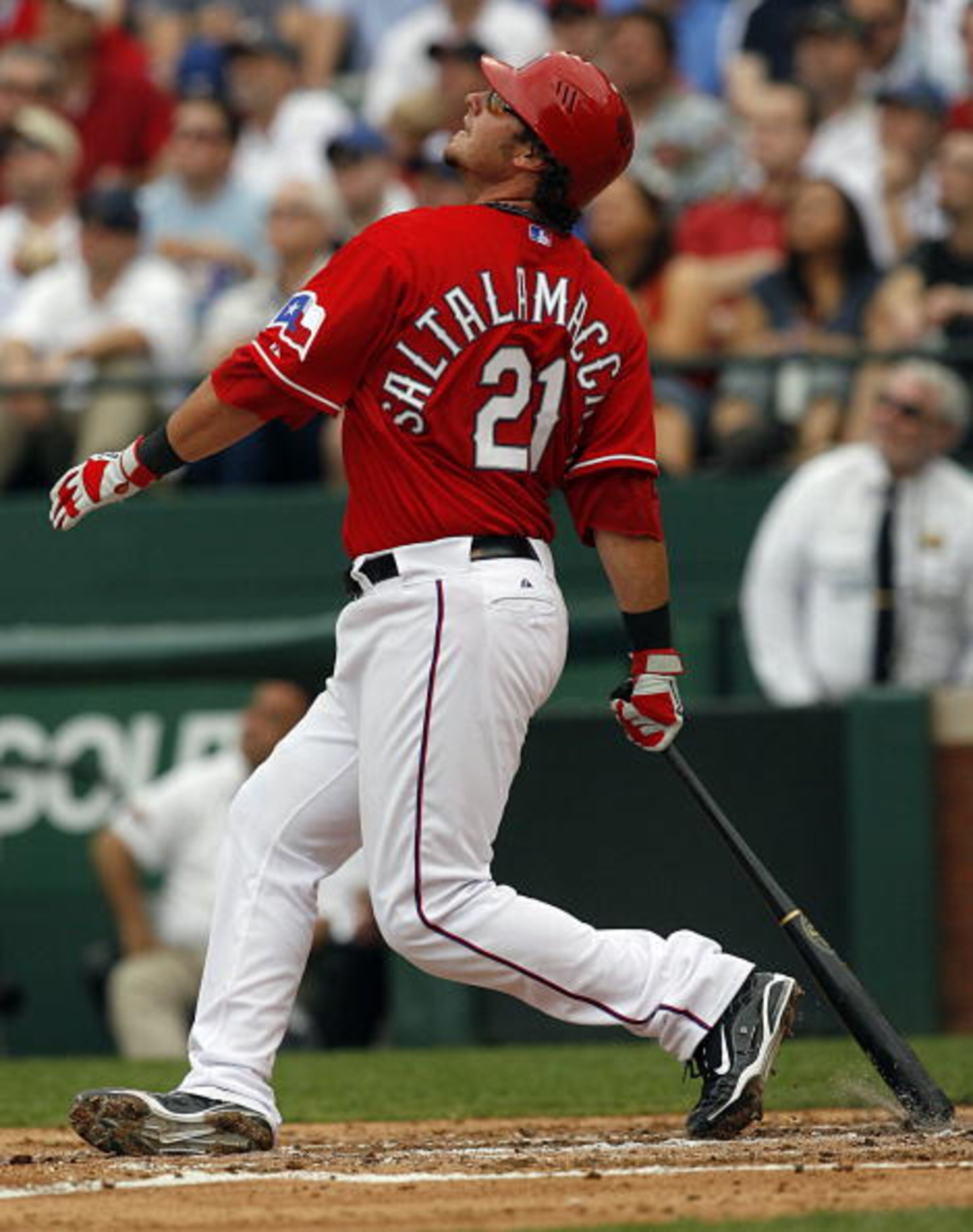 ARLINGTON, TX - APRIL 05:  Catcher Jarrod Saltalamacchia #21 of the Texas Rangers bats against the Toronto Blue Jays on Opening Day at Rangers Ballpark on April 5, 2010 in Arlington, Texas. (Photo by Tom Pennington/Getty Images)