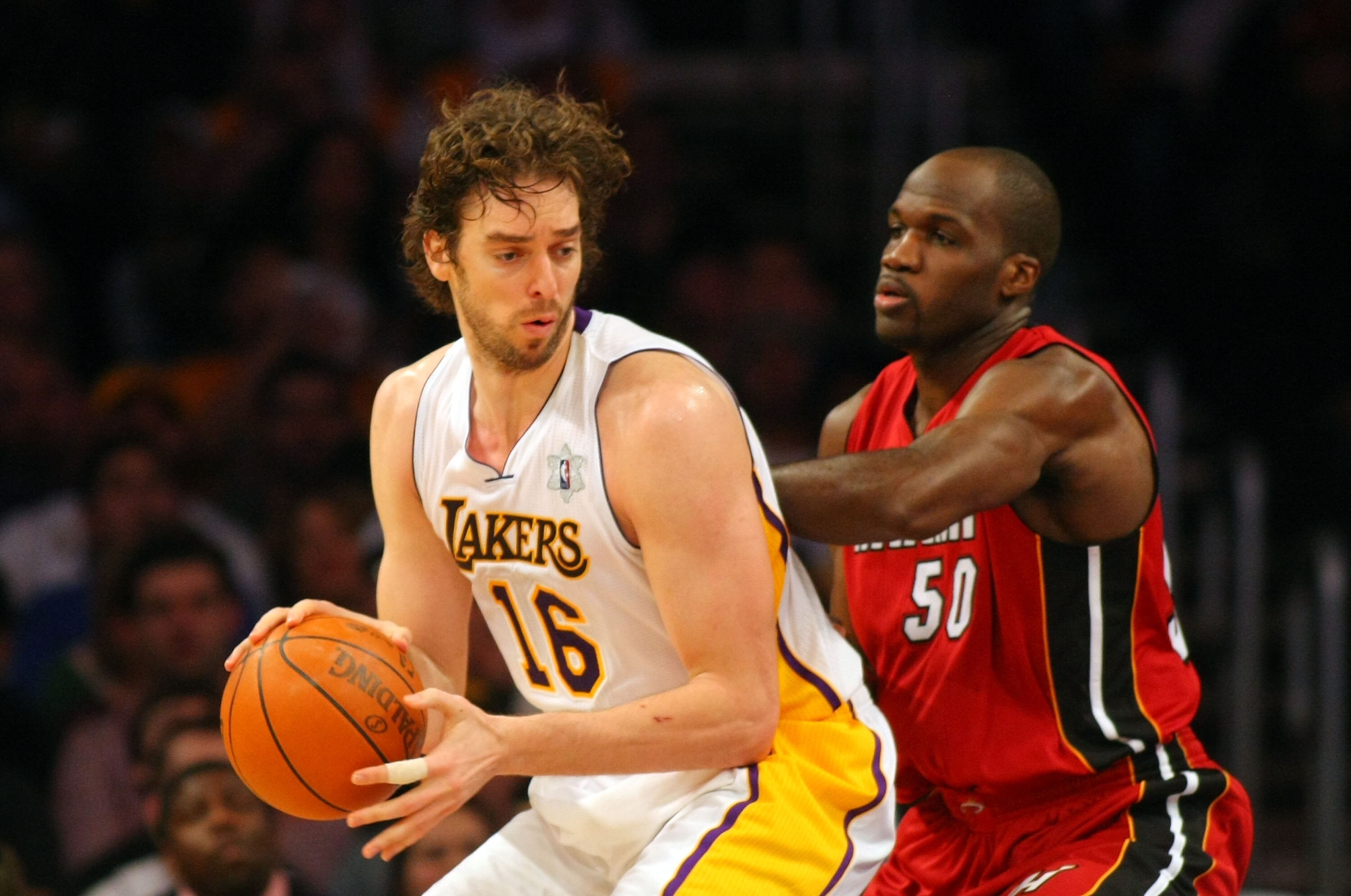 LOS ANGELES, CA - DECEMBER 25: Pau Gasol #16 of the Los Angeles Lakers posts up Joel Anthony #50 of the Miami Heat during the NBA game at Staples Center on December 25, 2010 in Los Angeles, California. The Heat defeated the Lakers 96-80. (Photo by Victor 