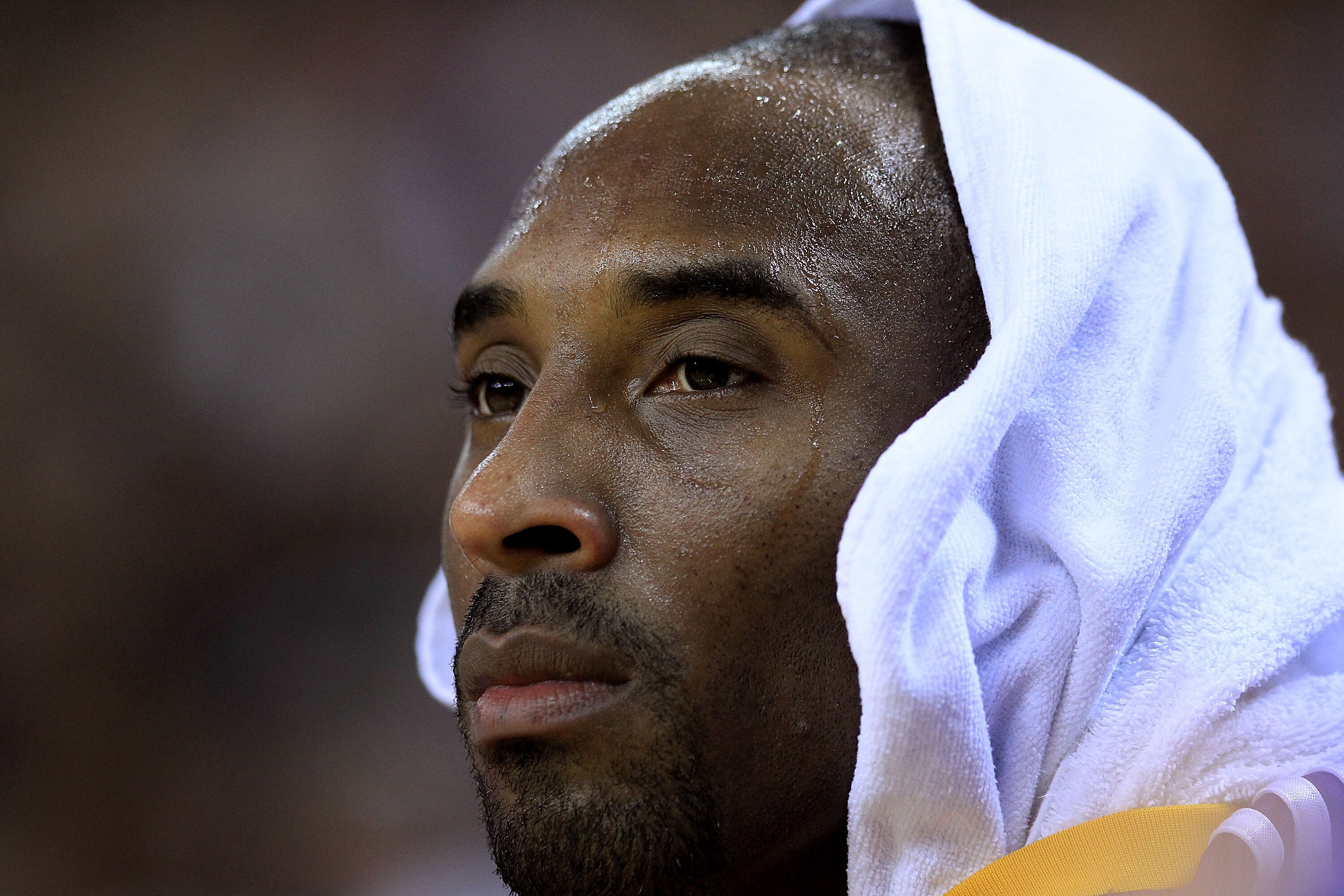 OAKLAND, CA - JANUARY 12:  Kobe Bryant #24 of the Los Angeles Lakers sits on the bench during their game against the Golden State Warriors at Oracle Arena on January 12, 2011 in Oakland, California. NOTE TO USER: User expressly acknowledges and agrees tha