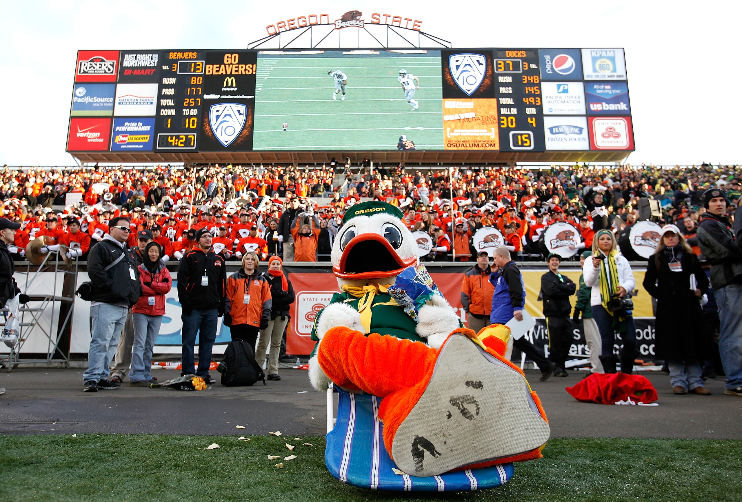 CORVALLIS, OR - DECEMBER 04:  Puddles the mascot of the Oregon Ducks eats Tostitios corn chips after the 37-20 victory over the Oregon State Beavers clinched a spot in the Tostitos BCS National Championship game during the 114th Civil War on December 4, 2