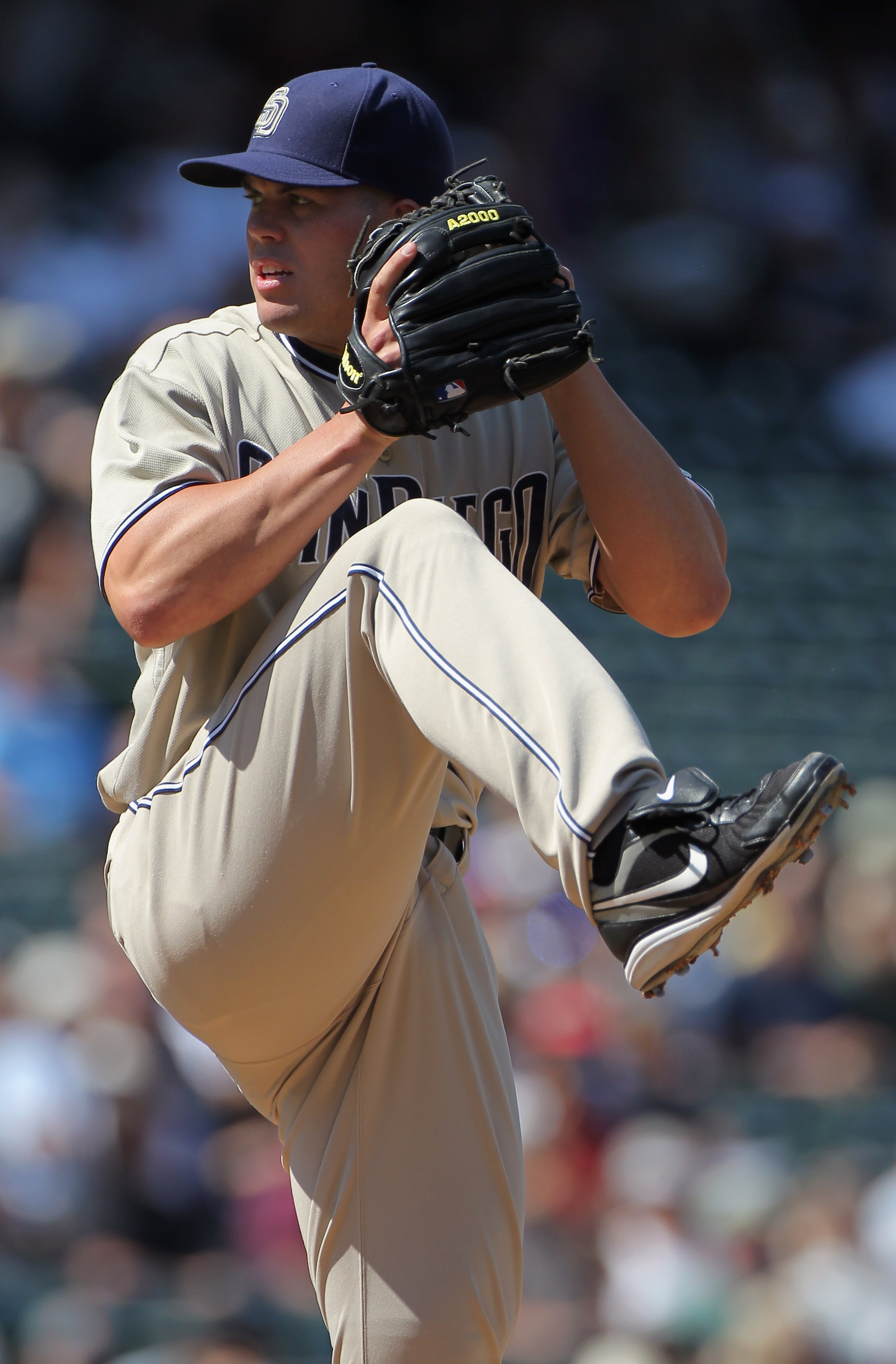 DENVER - SEPTEMBER 15:  Starting pitcher Clayton Richard #33 of the San Diego Padres delivers against the Colorado Rockies at Coors Field on September 15, 2010 in Denver, Colorado. Richard collected the loss as the Rockies defeated the Padres 9-6.  (Photo