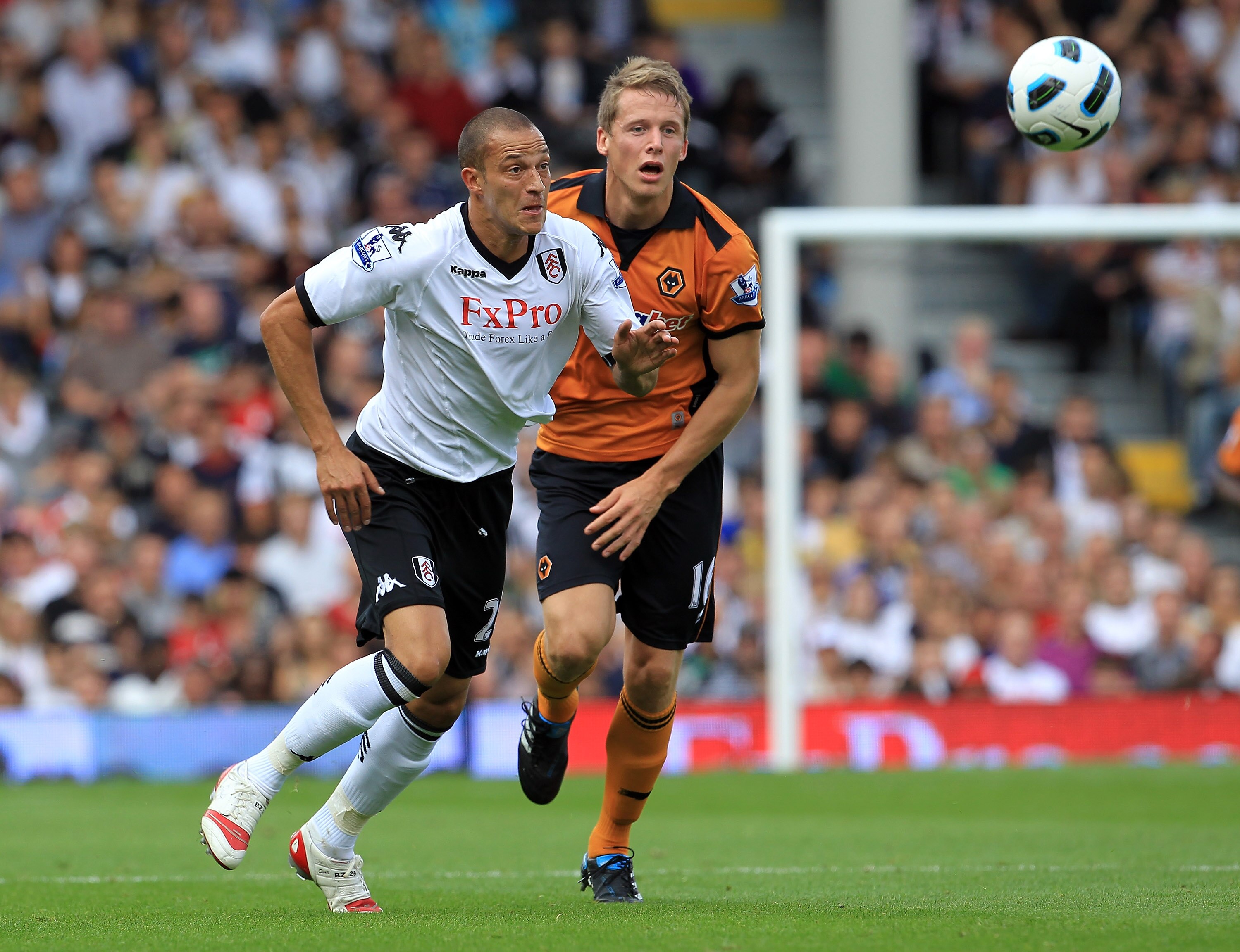 LONDON, ENGLAND - SEPTEMBER 11:  Bobby Zamora (L) of Fulham in action with Christophe Berra of Wolverhampton Wanderers during the Barclays Premier League match between Fulham and Wolverhampton Wanderers at Craven Cottage on September 11, 2010 in London, E