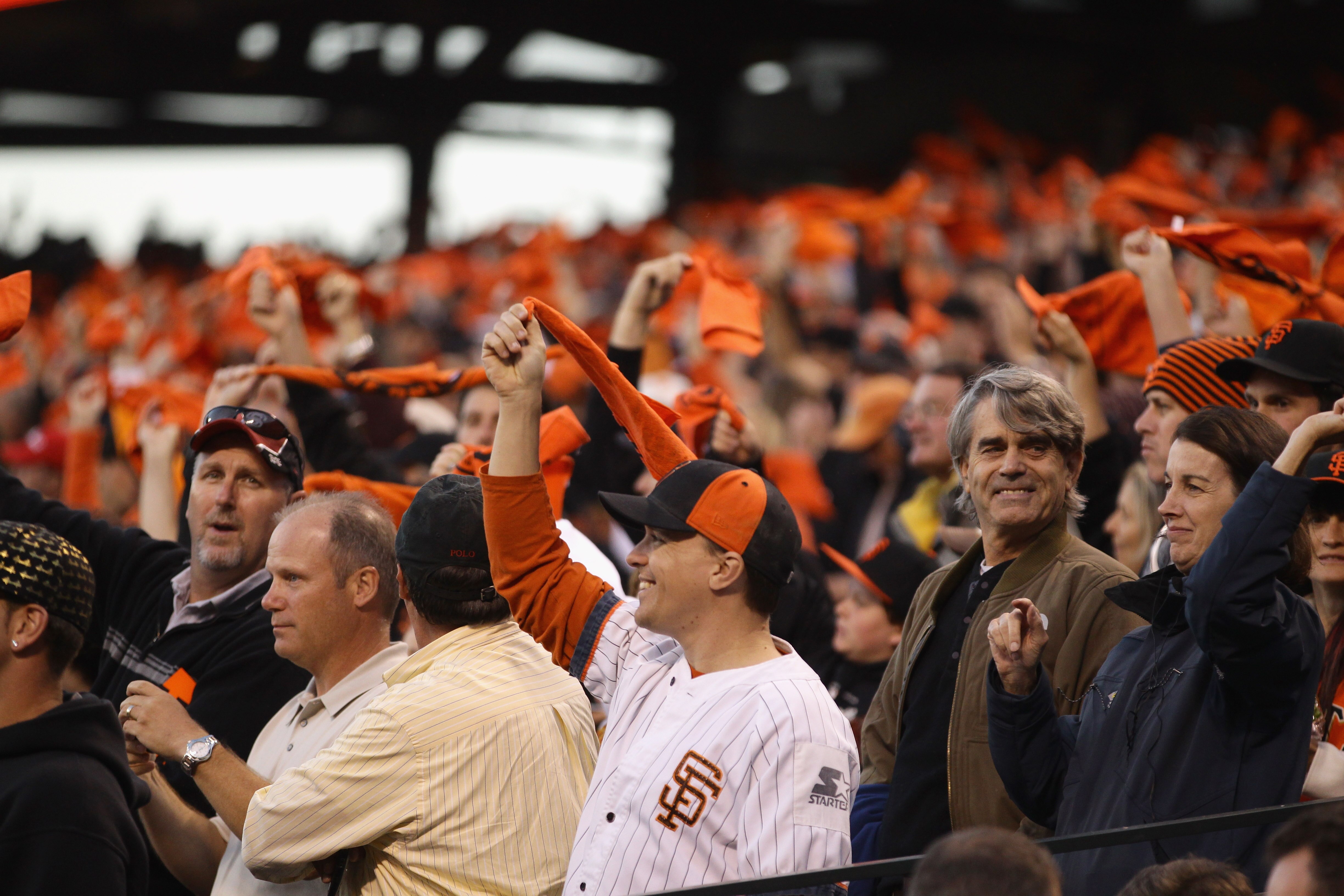 SAN FRANCISCO - OCTOBER 07:  Fans wave their rally flags before the start of the Atlanta Braves game against the San Francisco Giants in game 1 of the NLDS at AT&T Park on October 7, 2010 in San Francisco, California.  (Photo by Ezra Shaw/Getty Images)